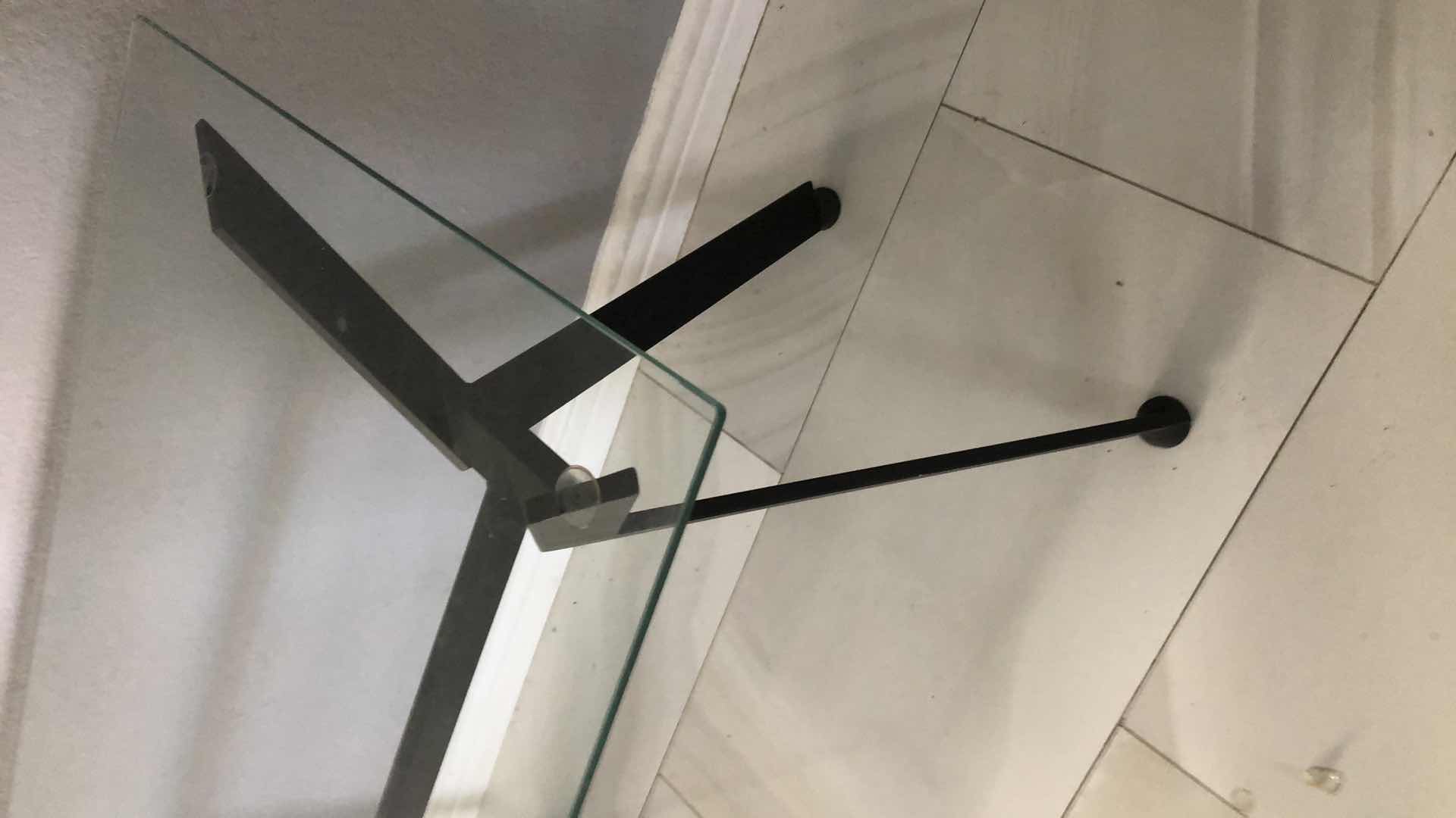 Photo 1 of GLASS TOP TABLE 
49” X 28” H 31”