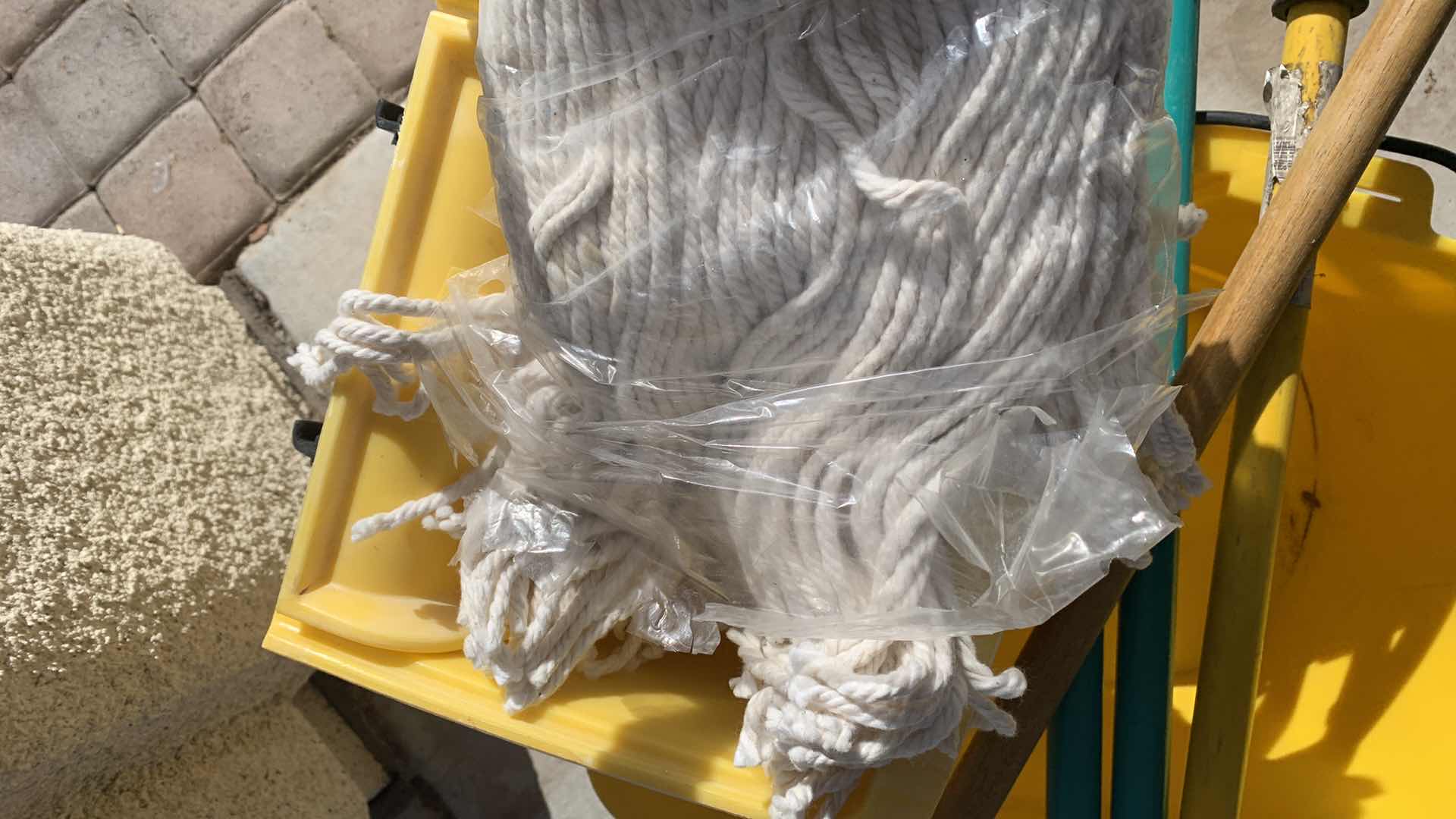 Photo 1 of MOPS AND A RUBBERMADE  BUCKET WITH WHEELS