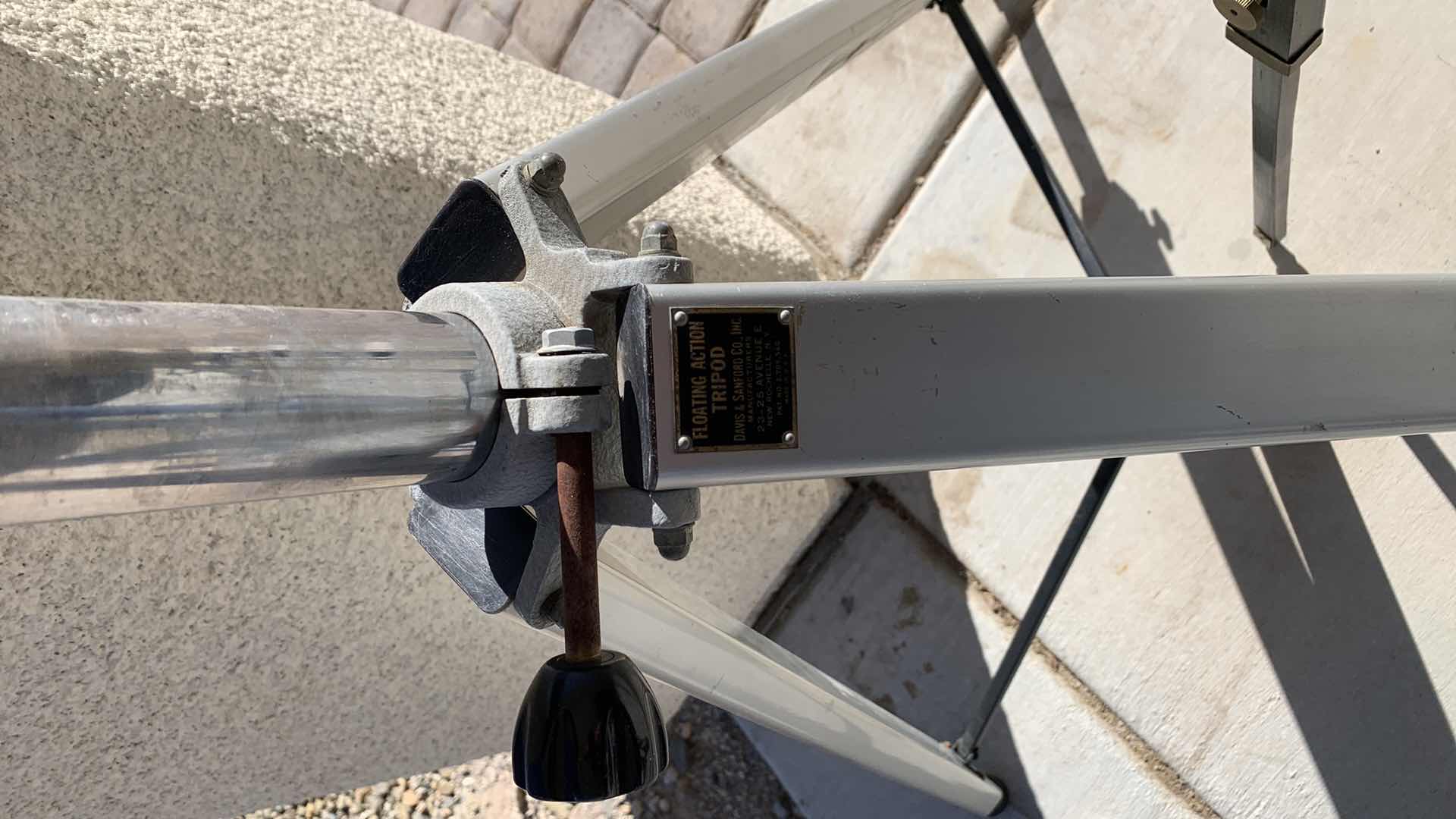 Photo 1 of A FLOATING ACTION TRIPOD AND A BRASS AND WOODEN ONE