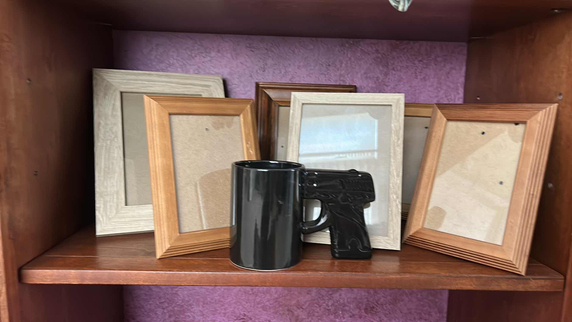 Photo 1 of 6 PICTURE FRAMES AND BLACK PISTOL COFFEE MUG