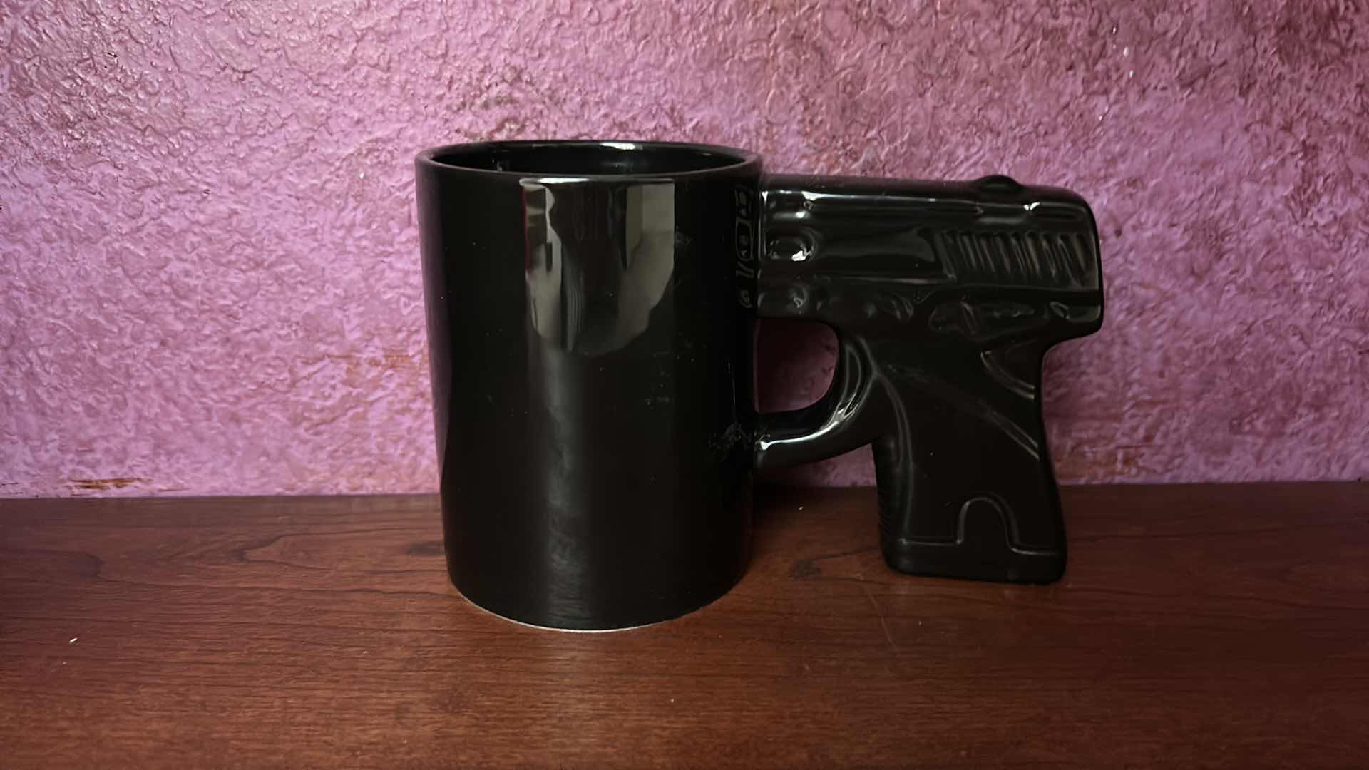 Photo 1 of 6 PICTURE FRAMES AND BLACK PISTOL COFFEE MUG