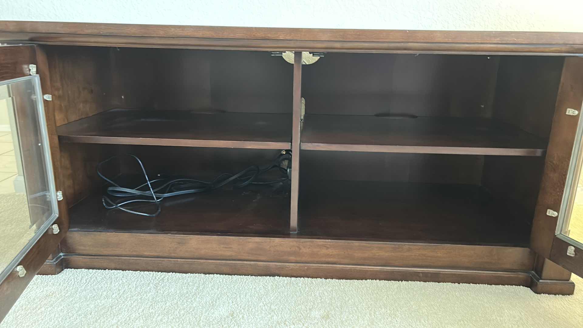 Photo 1 of BASSET WOOD MEDIA CABINET WITH BEVELED GLASS AND COMES WITH REMOVABLE WOOD INSERTS TO CHANGE OUT GLASS. 59” x 24.5” x H26”