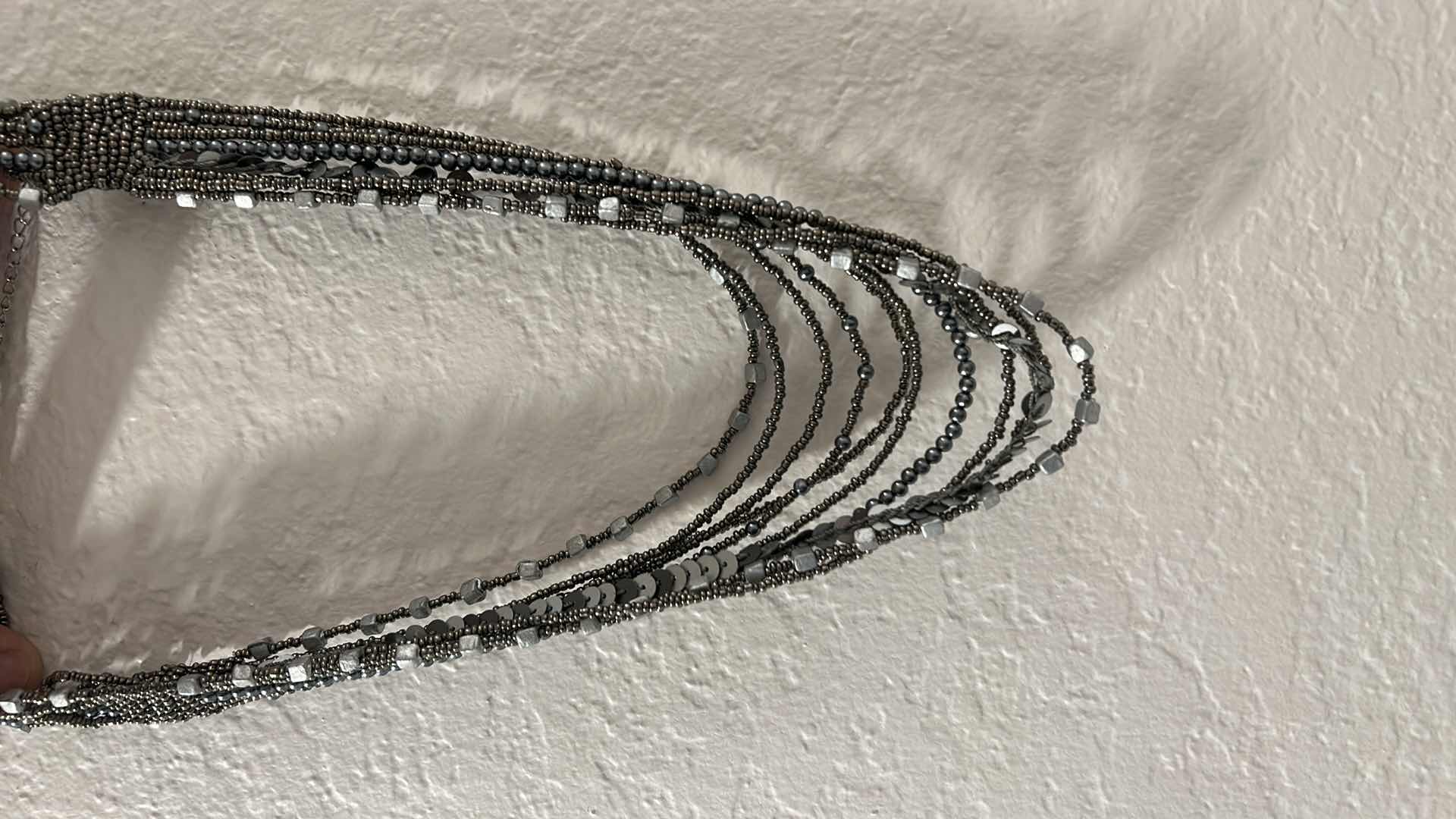 Photo 1 of COSTUME JEWELRY NECKLACES AND TWO HOLDERS