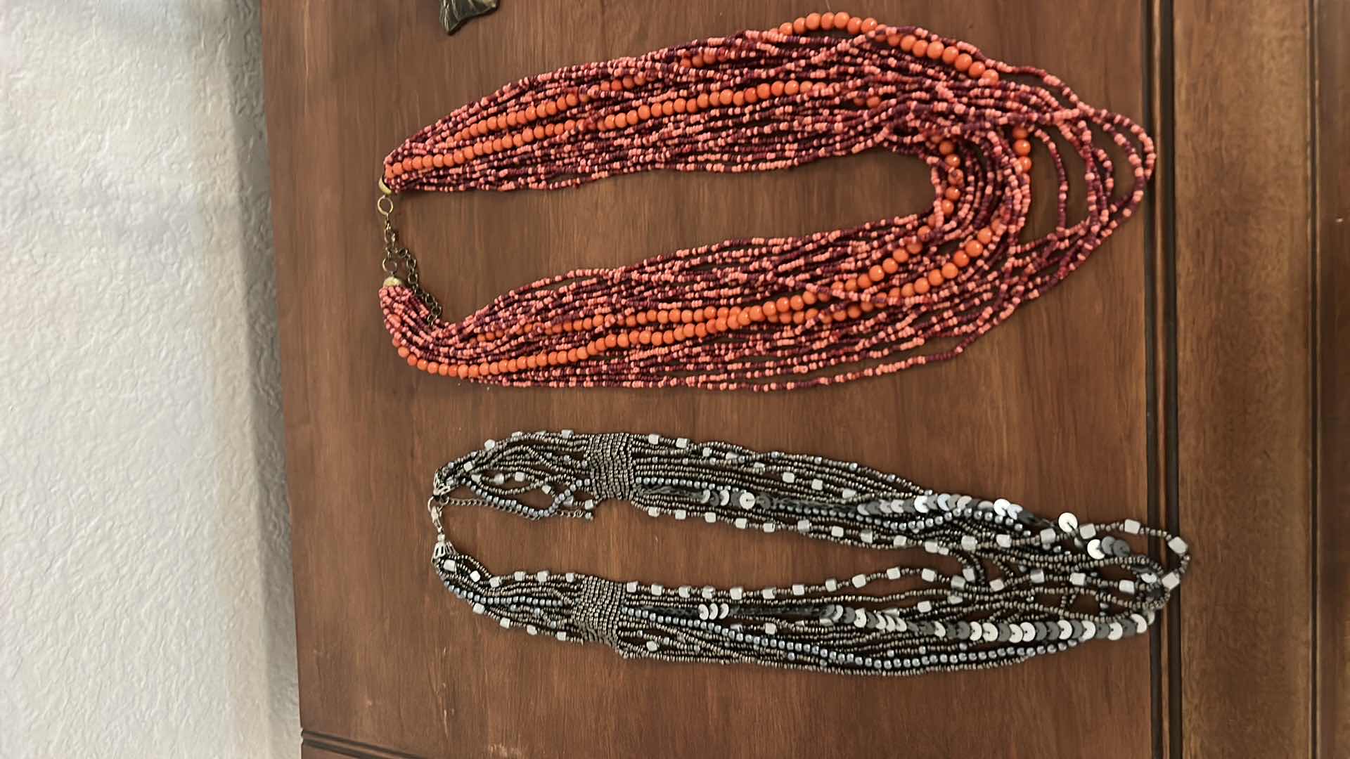 Photo 1 of COSTUME JEWELRY NECKLACES AND TWO HOLDERS