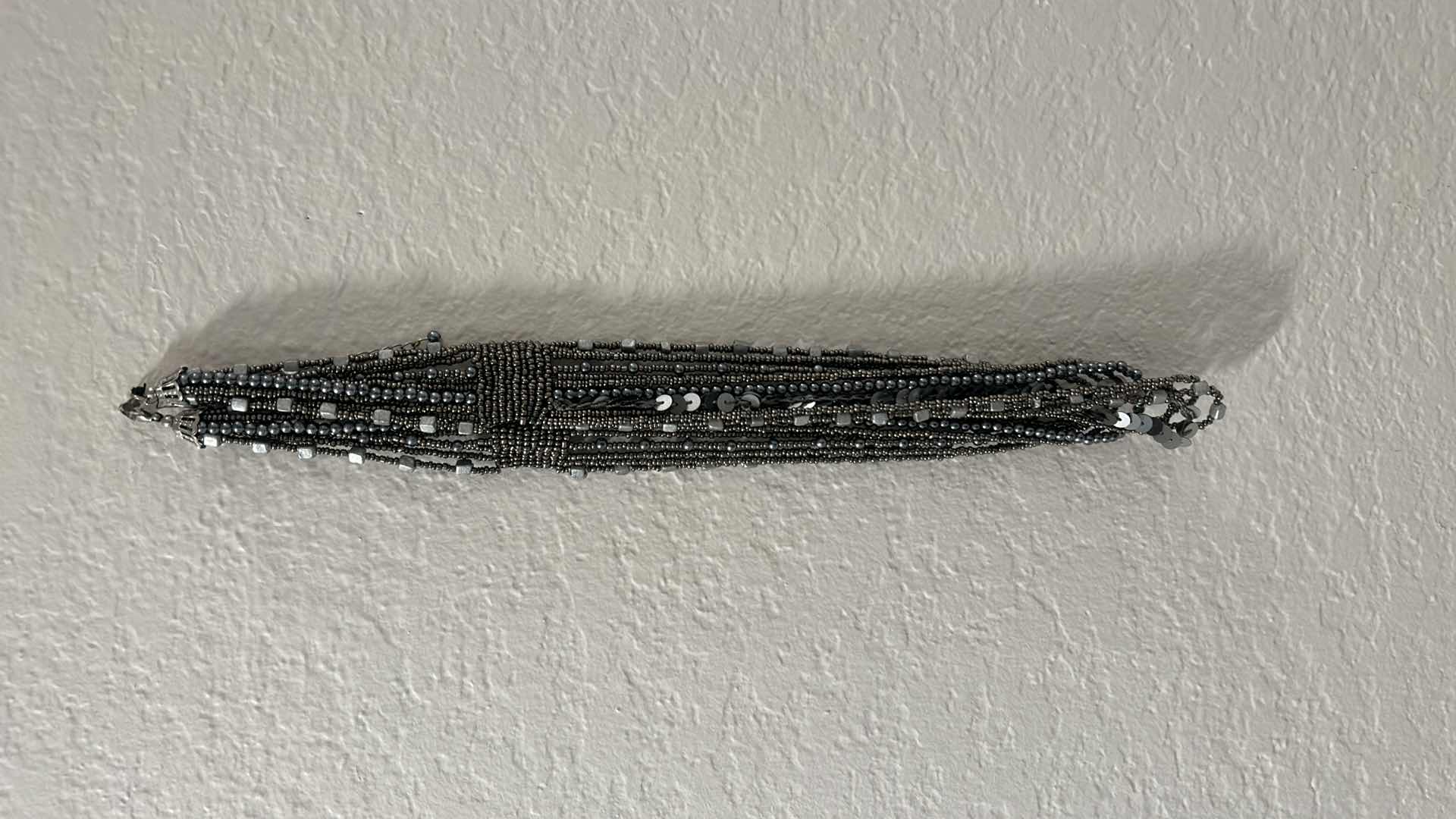 Photo 1 of COSTUME JEWELRY NECKLACES AND TWO HOLDERS