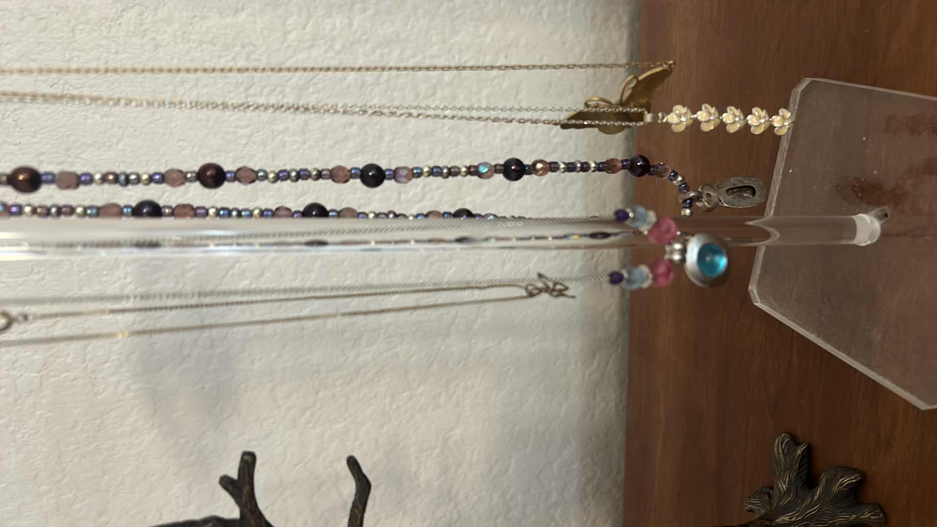 Photo 1 of COSTUME JEWELRY NECKLACES AND TWO HOLDERS