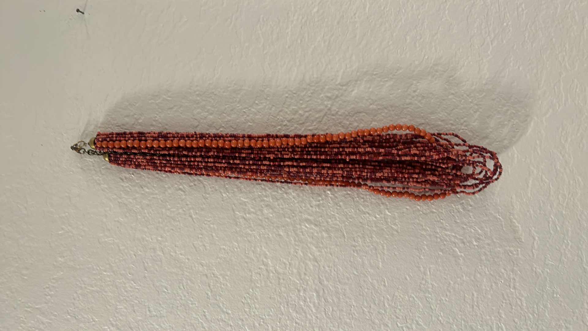 Photo 1 of COSTUME JEWELRY NECKLACES AND TWO HOLDERS