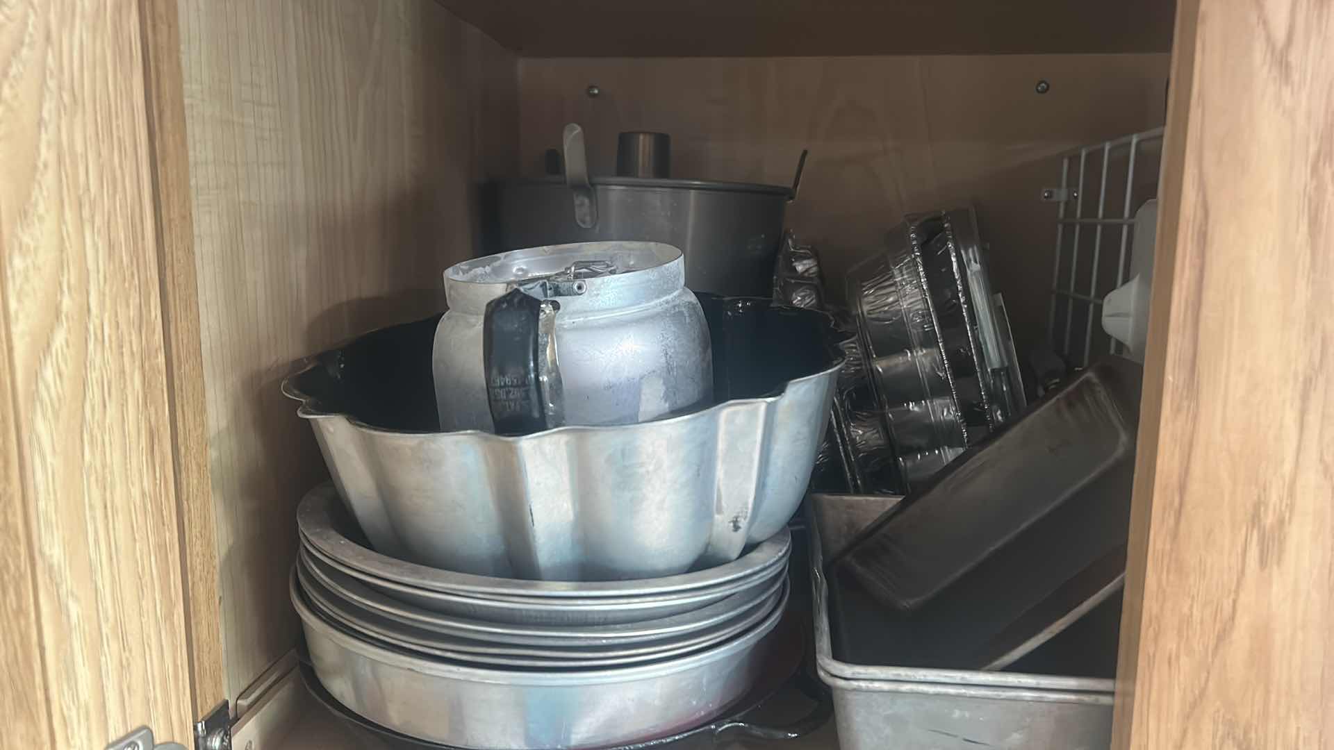 Photo 1 of CONTENTS OF KITCHEN CABINET