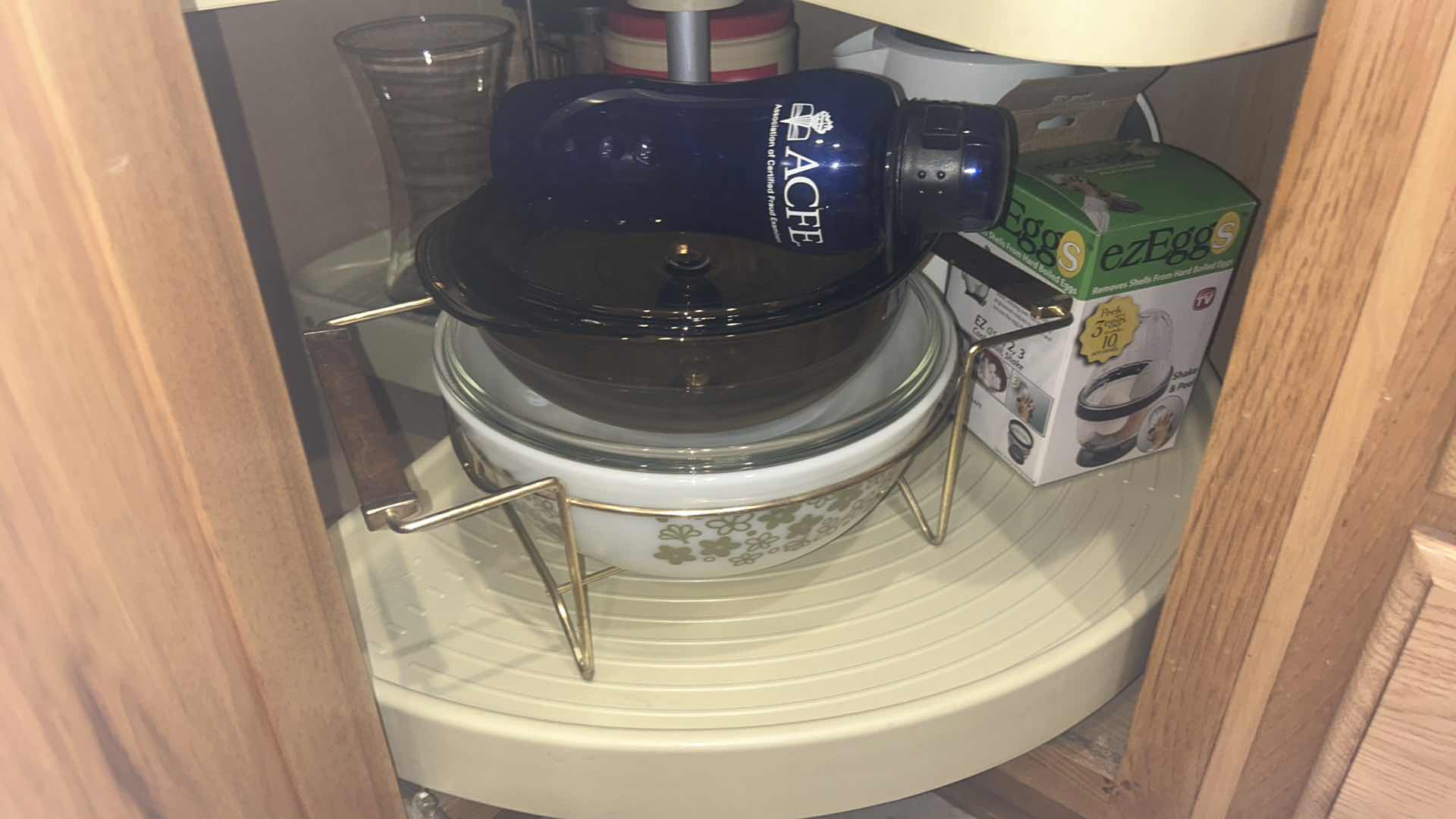 Photo 1 of CONTENTS OF KITCHEN CORNER CABINET