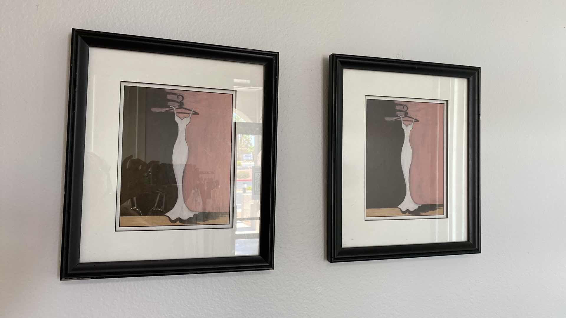 Photo 1 of BLACK FRAMED GLAMOUR DRESS PAIR OF ARTWORK 14” X 17”