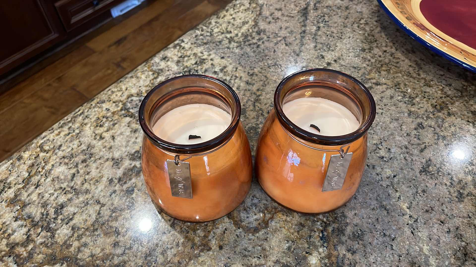 Photo 1 of ORANGE GLASS WOOD WICK CANDLES