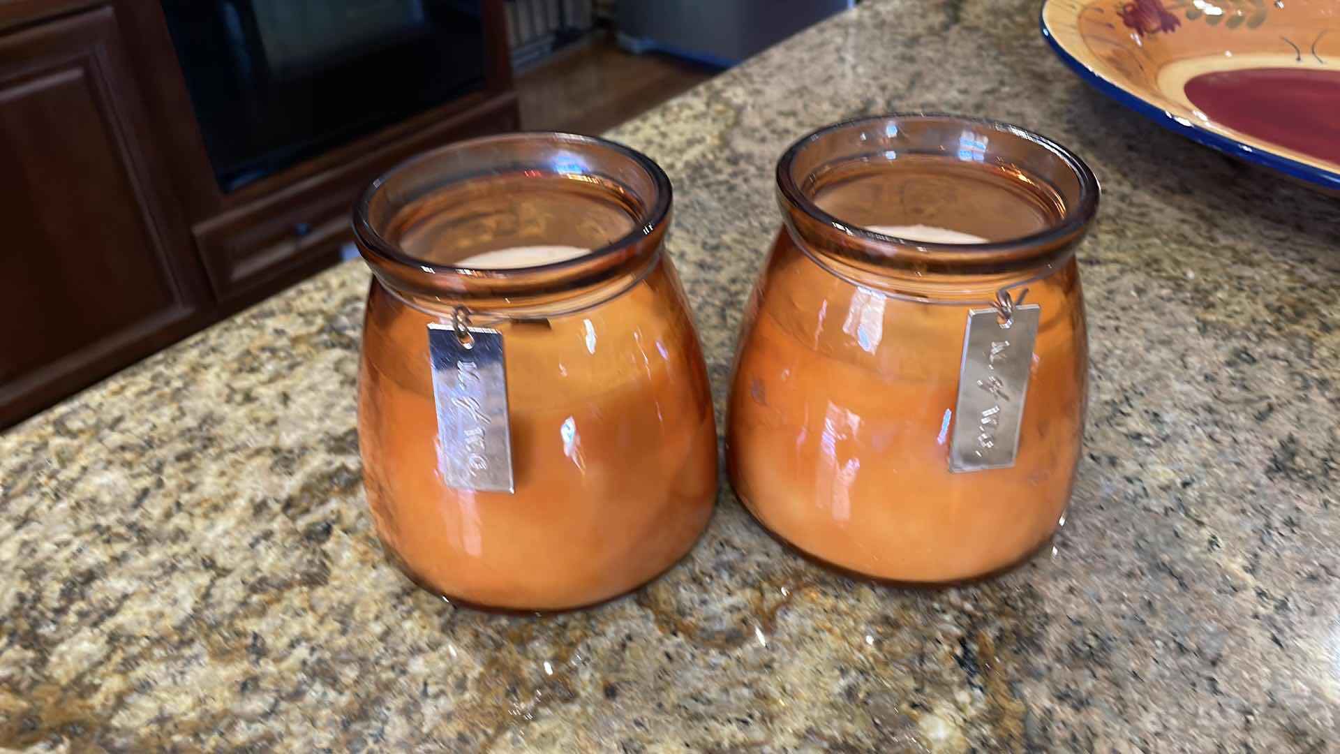 Photo 1 of ORANGE GLASS WOOD WICK CANDLES