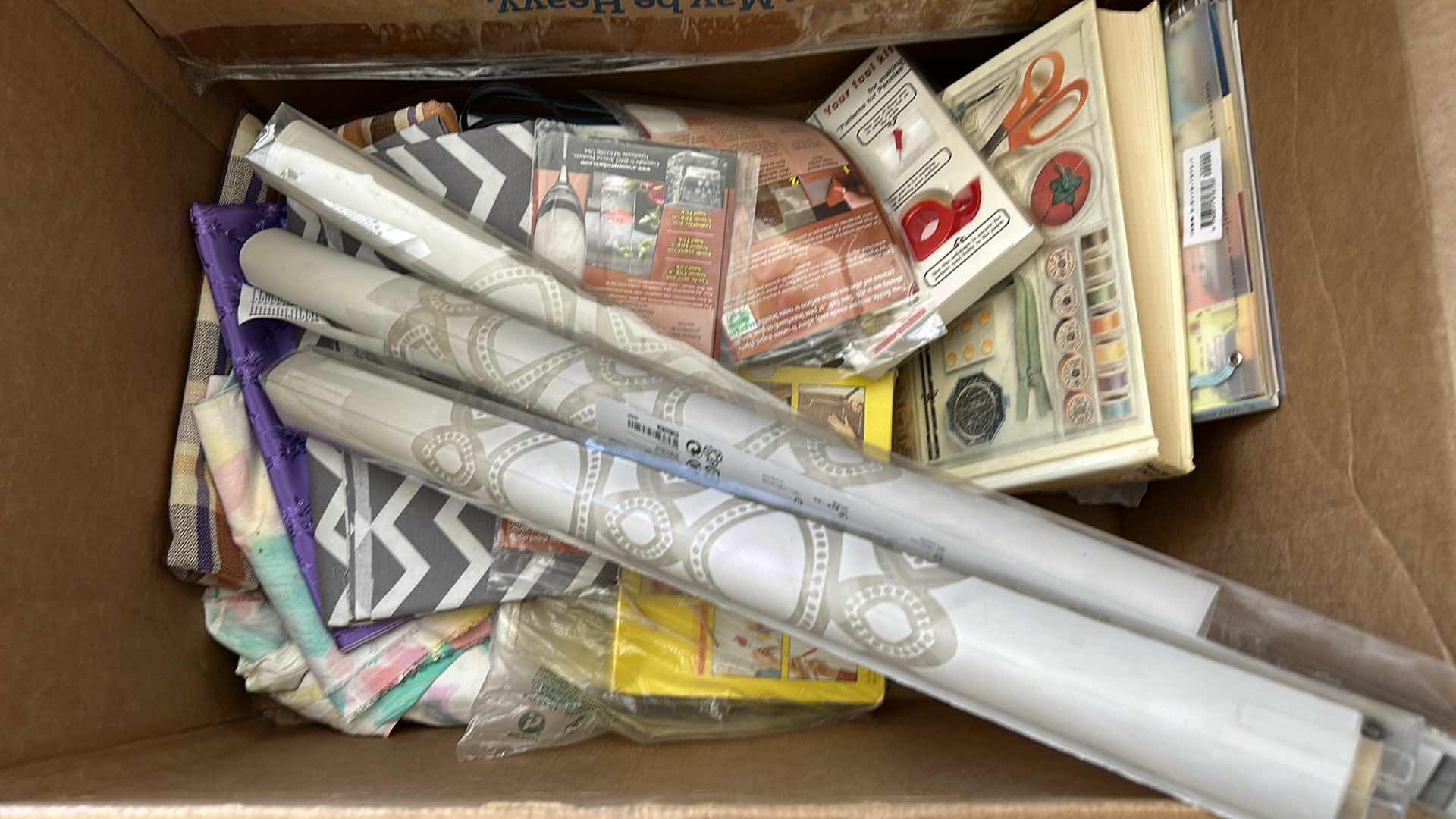 Photo 1 of BOX OF SEWING SUPPLIES AND BOOKS 