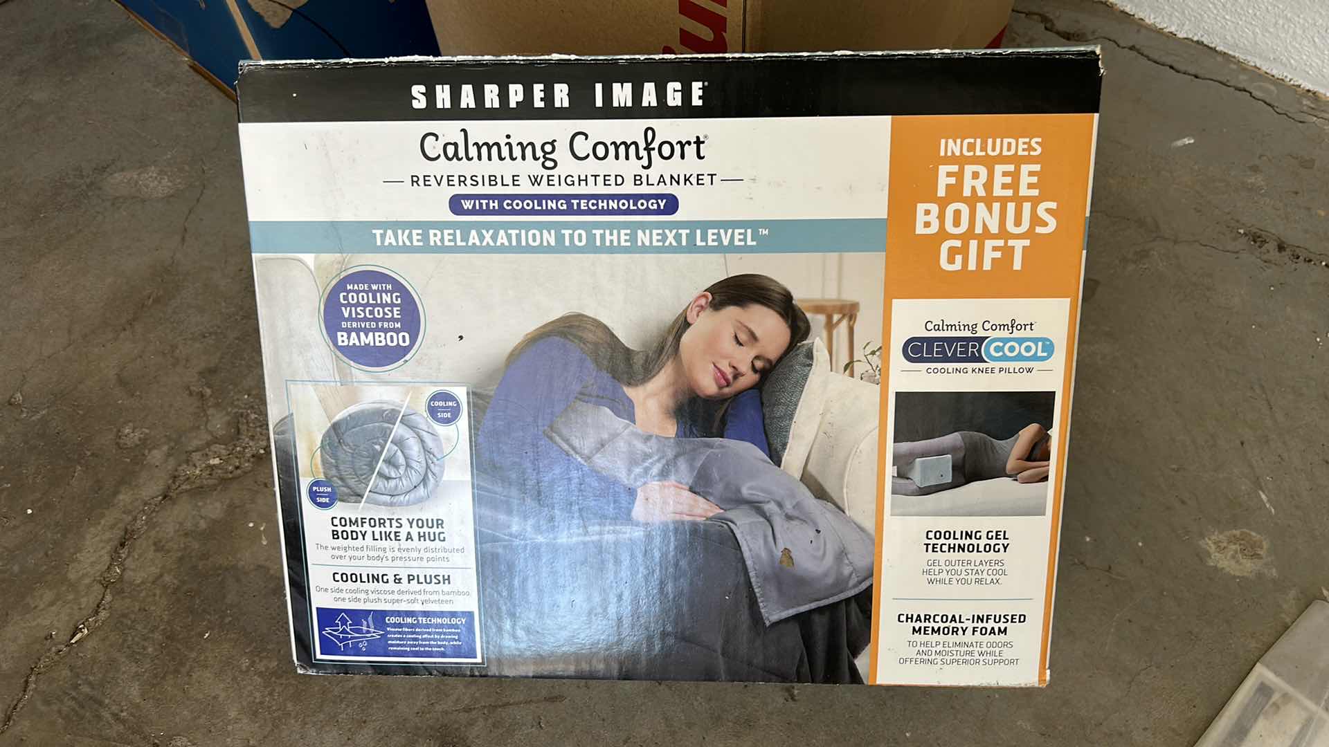 Photo 1 of NEW SHARPER IMAGE CALMING WEIGHTED REVERSIBLE BLANKET
