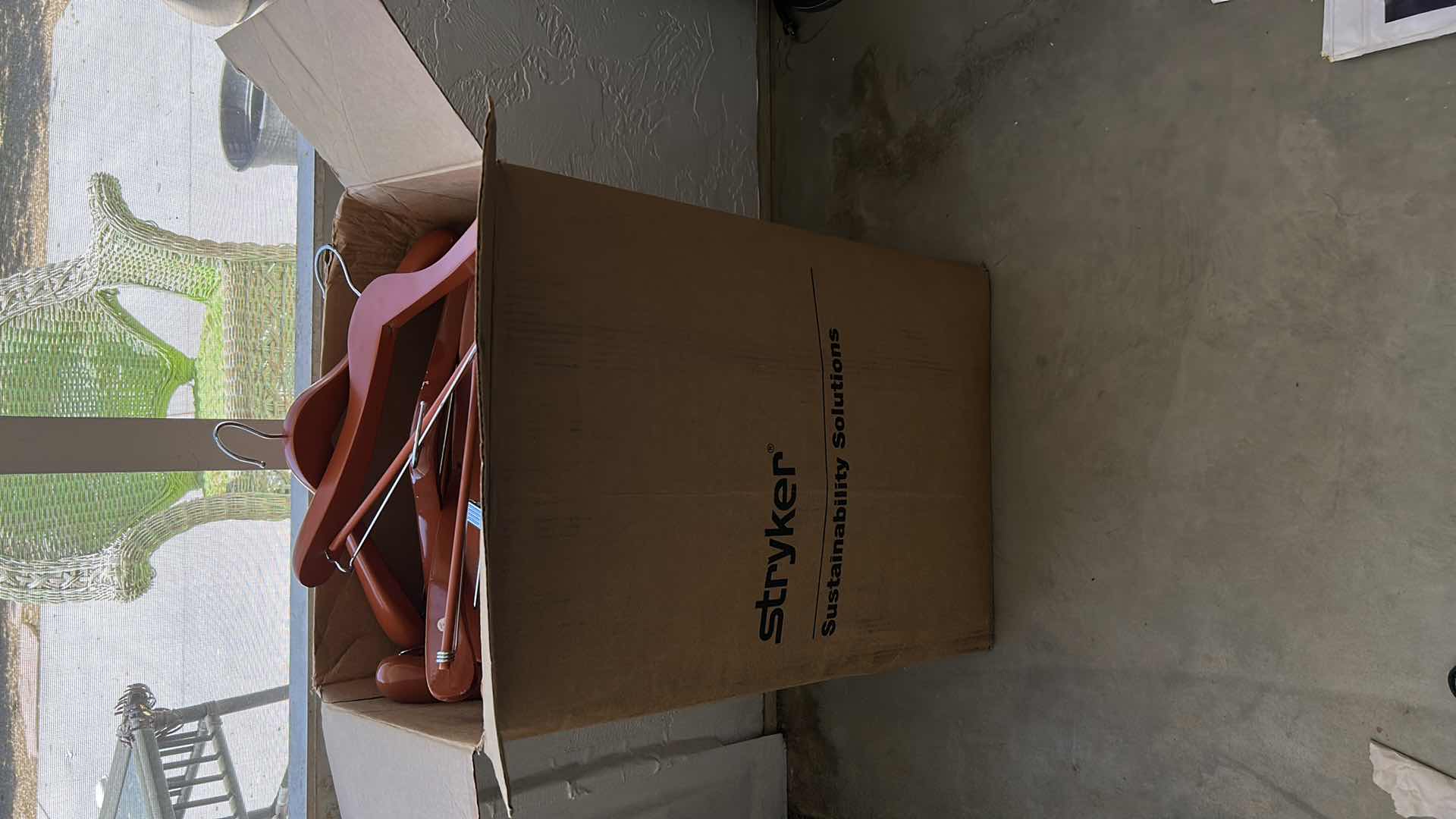 Photo 1 of LARGE BOX FULL OF WOOD HANGERS