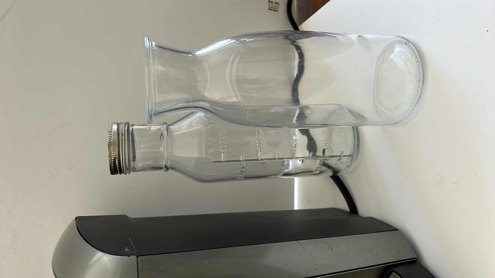 Photo 1 of KEURIG COFFEE MAKER AND 3 GLASS JARS