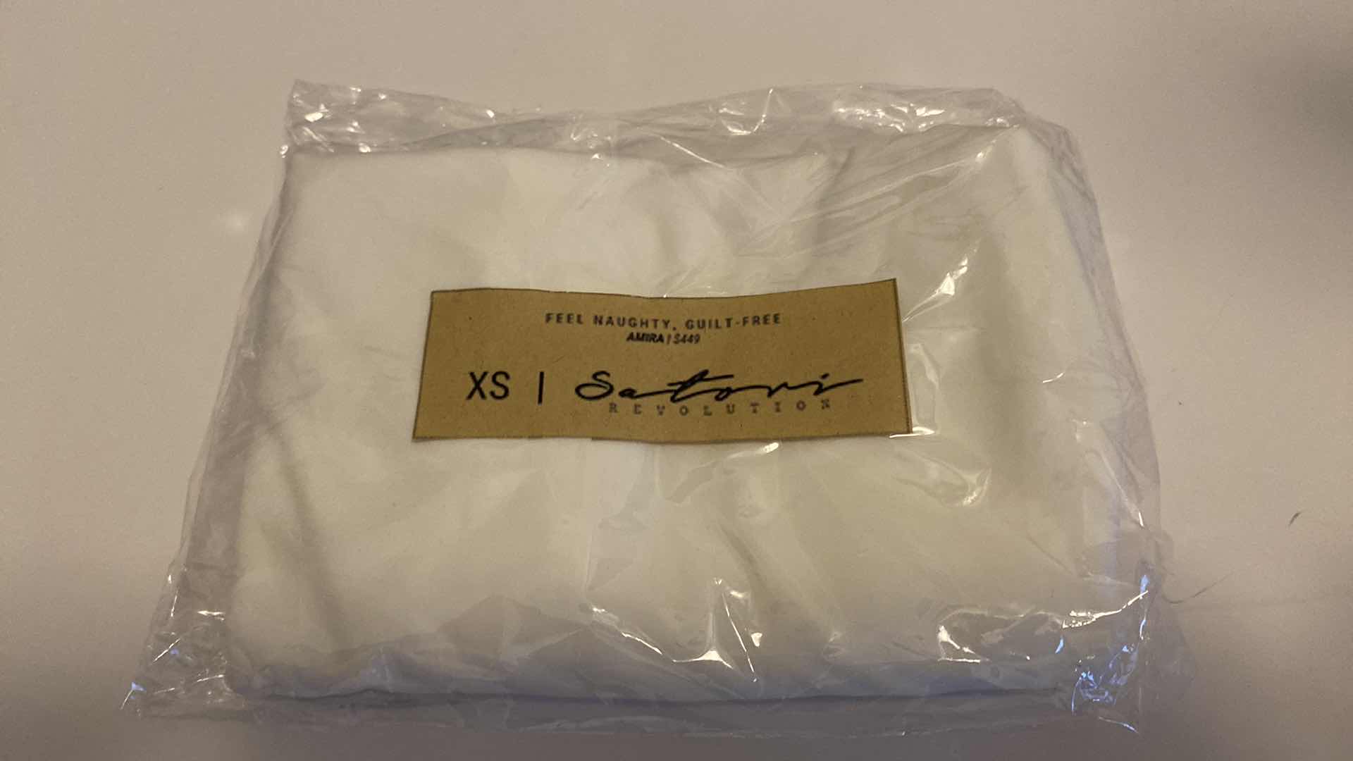 Photo 7 of SIZE X-SMALL AMIRA WHITE BODYSUIT FEATURES ROUND NECKLINE STRAPS AND HI-CUT LEGS. ULTRA SOFTCOTTON LINING FOR PEAK COMFORT.