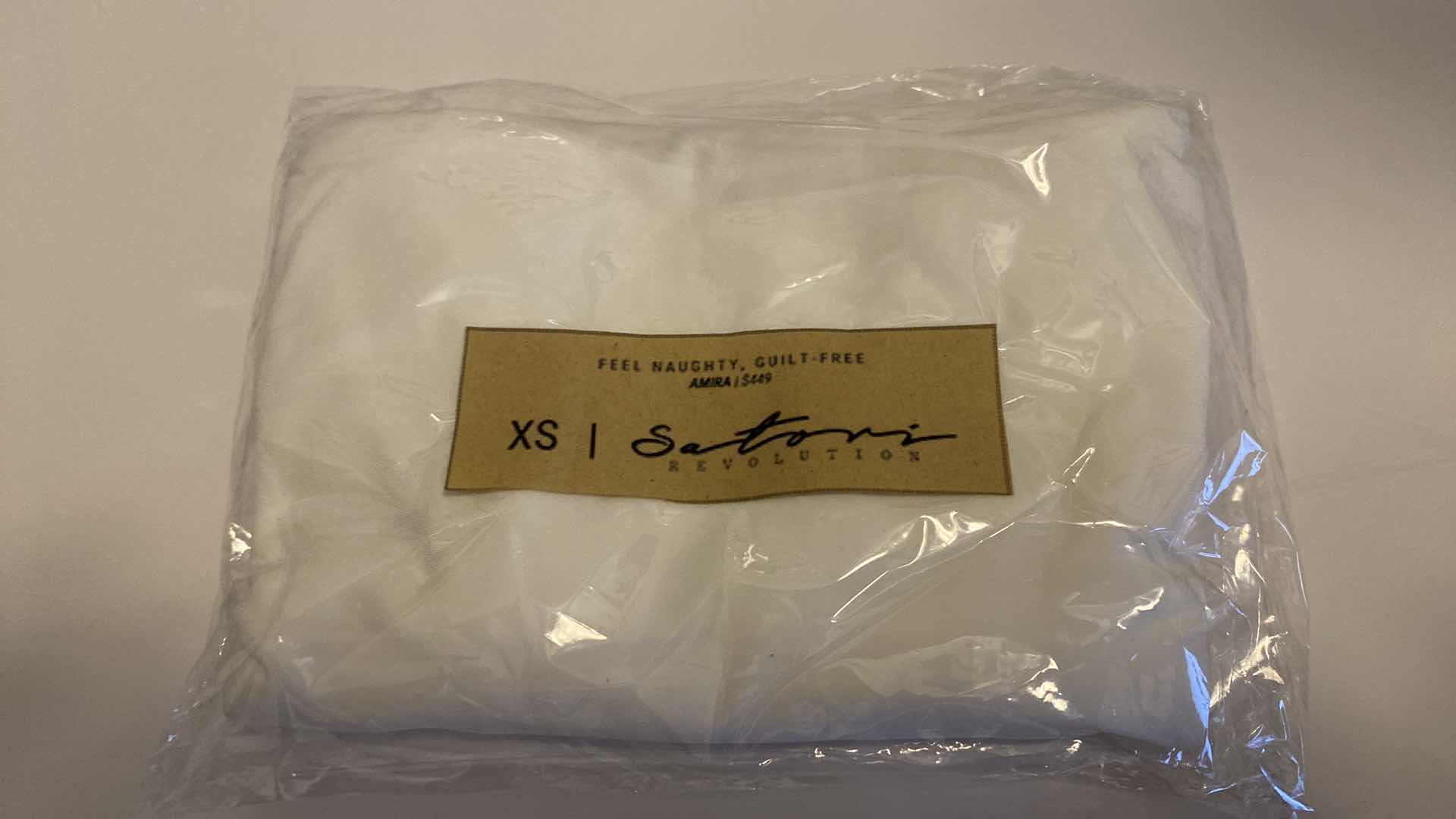 Photo 7 of SIZE X-SMALL AMIRA WHITE BODYSUIT FEATURES ROUND NECKLINE STRAPS AND HI-CUT LEGS. ULTRA SOFT COTTON LINING FOR PEAK COMFORT.