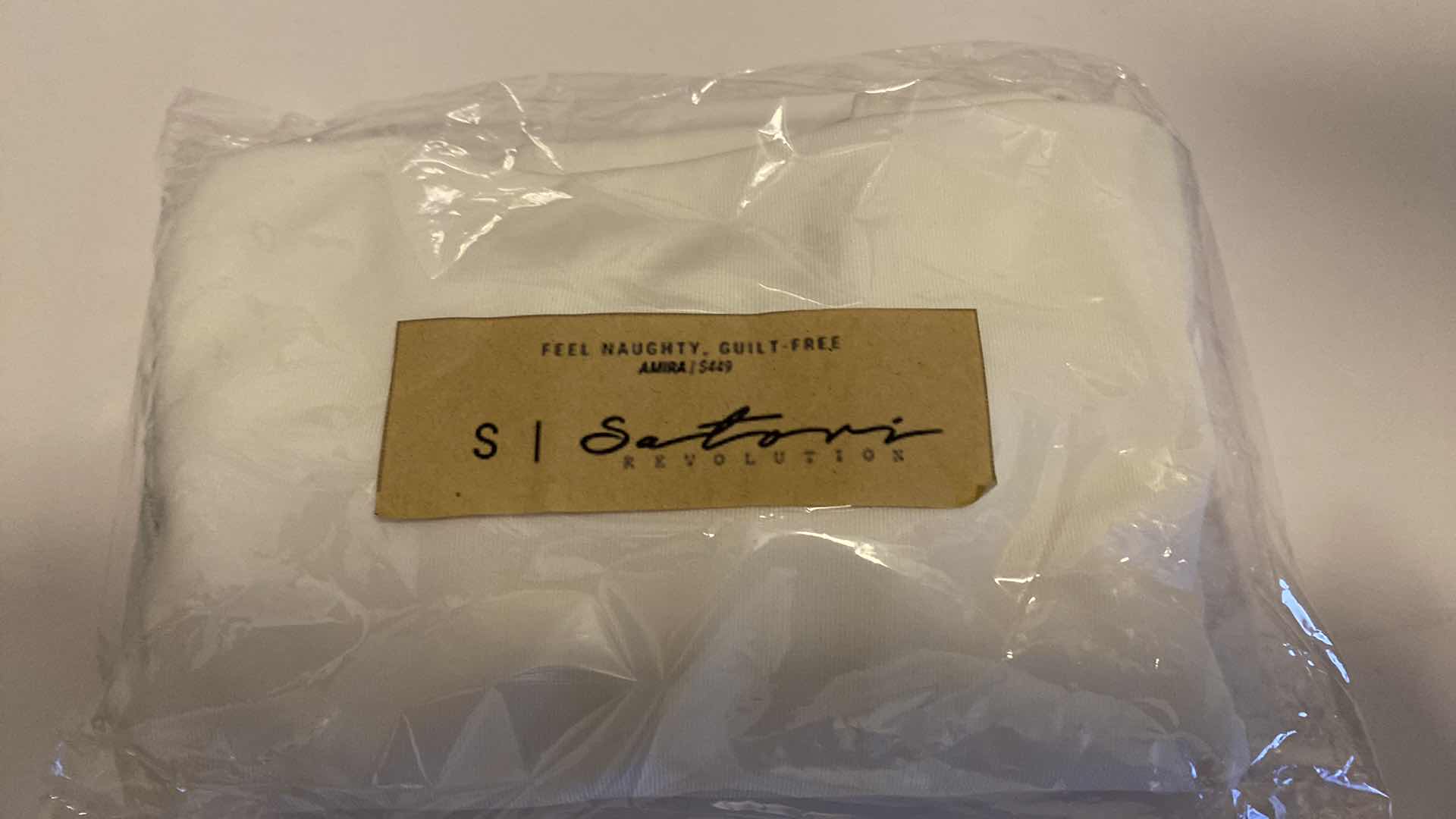 Photo 7 of SIZE SMALL AMIRA WHITE BODYSUIT FEATURES ROUND NECKLINE STRAPS AND HI-CUT LEGS. ULTRA SOFT COTTON LINING FOR PEAK COMFORT.