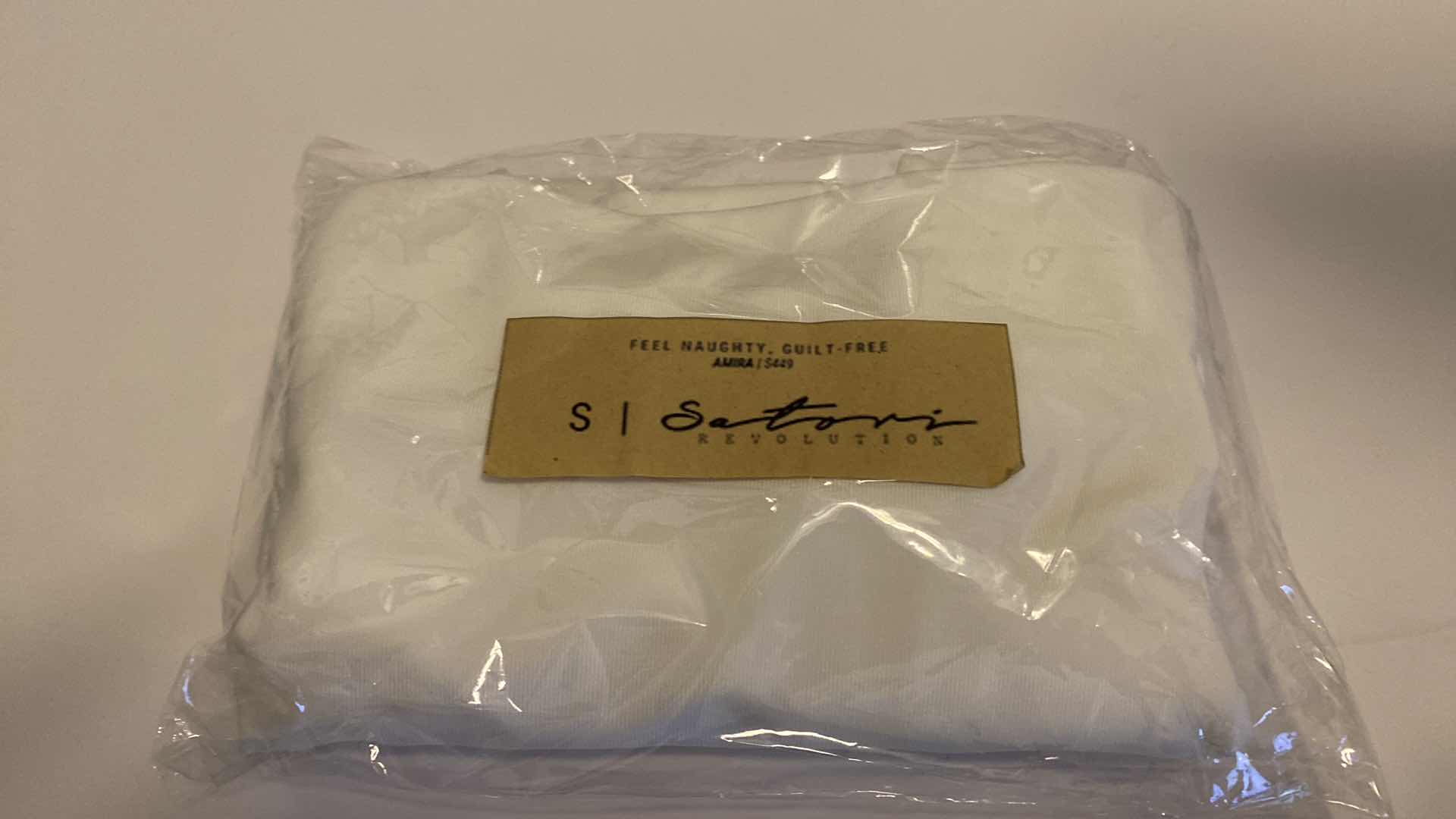 Photo 7 of SIZE SMALL AMIRA WHITE BODYSUIT FEATURES ROUND NECKLINE STRAPS AND HI-CUT LEGS. ULTRA SOFT COTTON LINING FOR PEAK COMFORT.