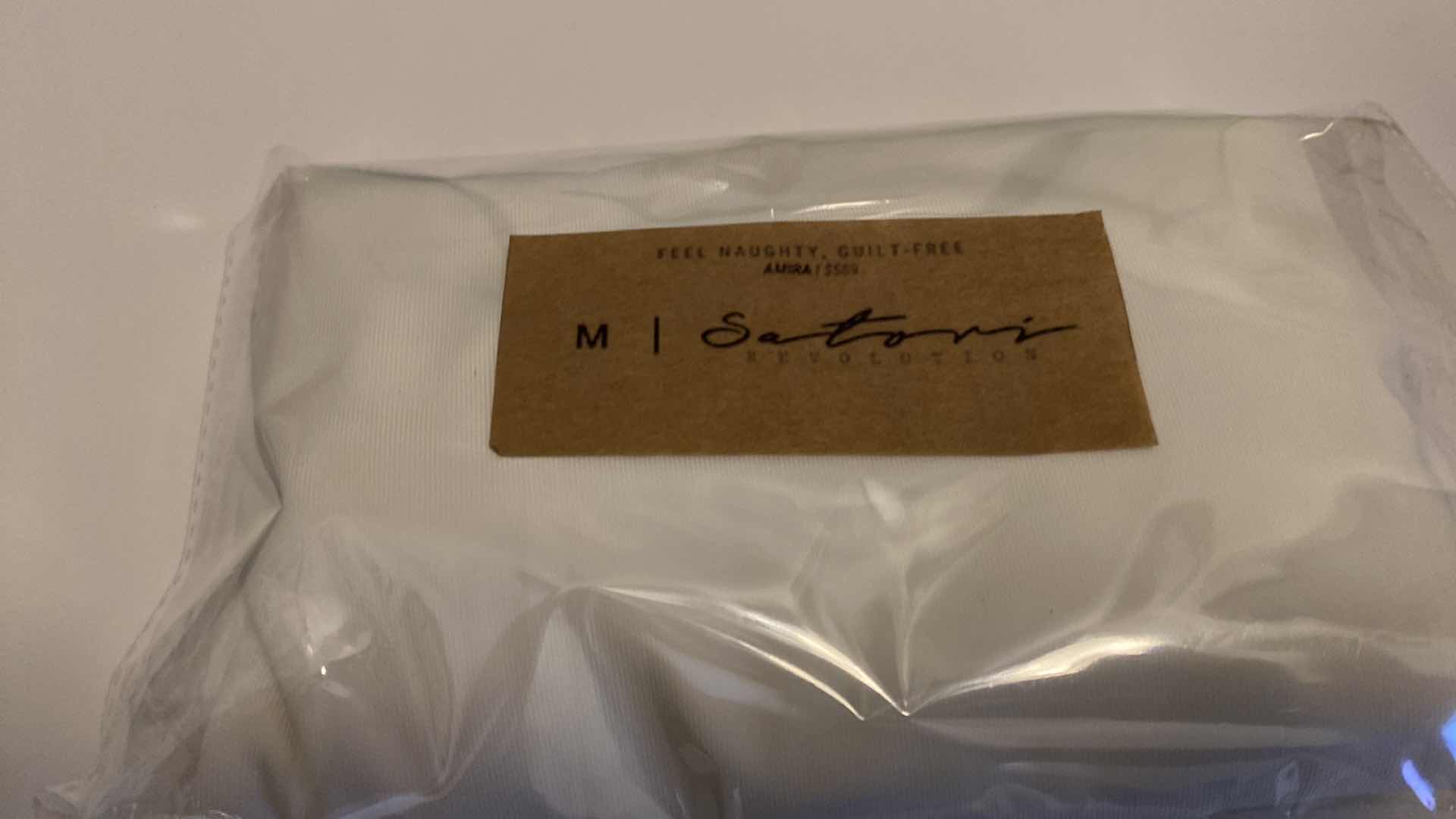 Photo 7 of SIZE MEDIUM AMIRA WHITE BODYSUIT FEATURES ROUND NECKLINE STRAPS AND HI-CUT LEGS. ULTRA SOFT COTTON LINING FOR PEAK COMFORT.