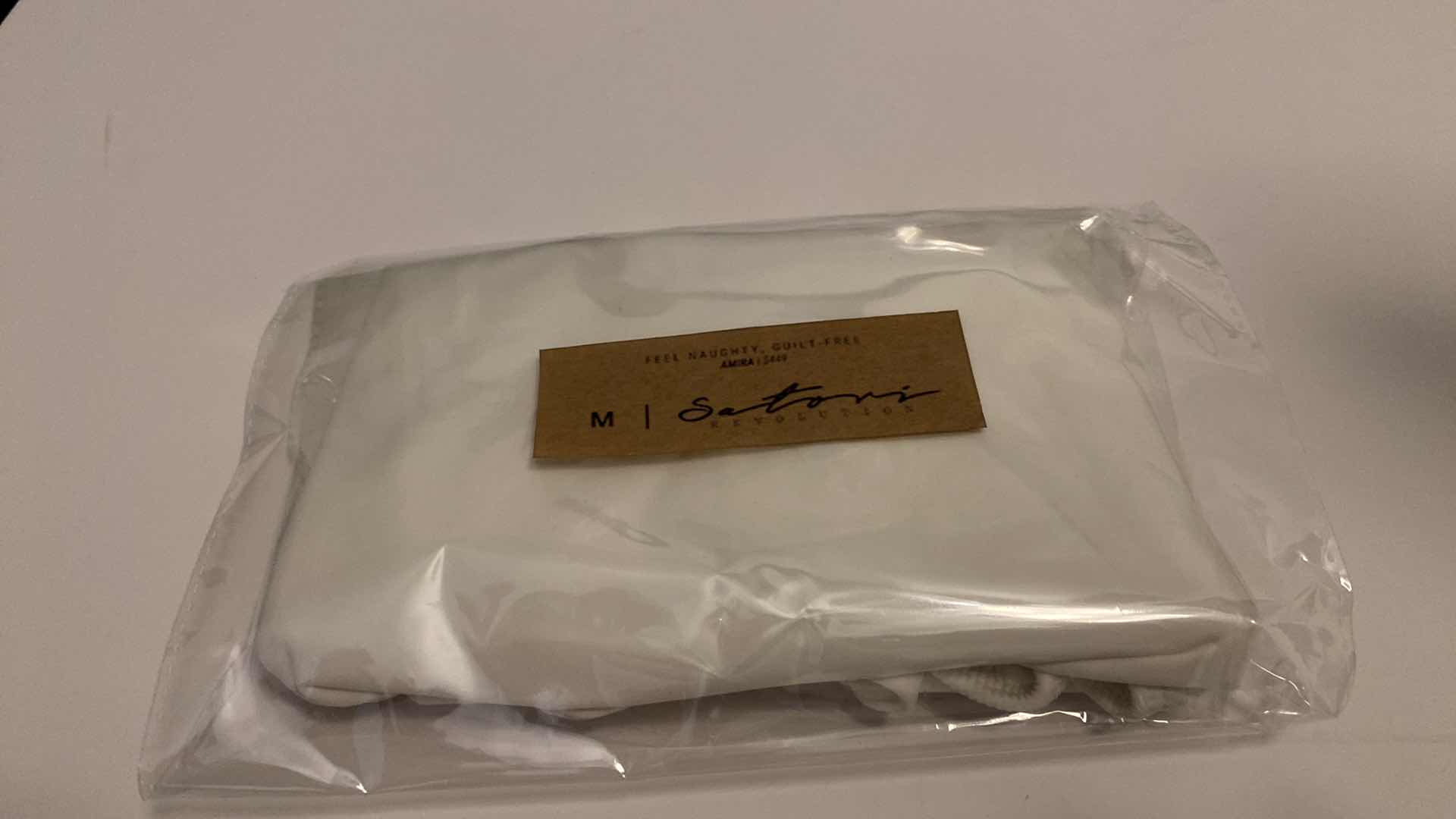 Photo 2 of SIZE MEDIUM AMIRA WHITE BODYSUIT FEATURES ROUND NECKLINE STRAPS AND HI-CUT LEGS. ULTRA SOFT COTTON LINING FOR PEAK COMFORT.