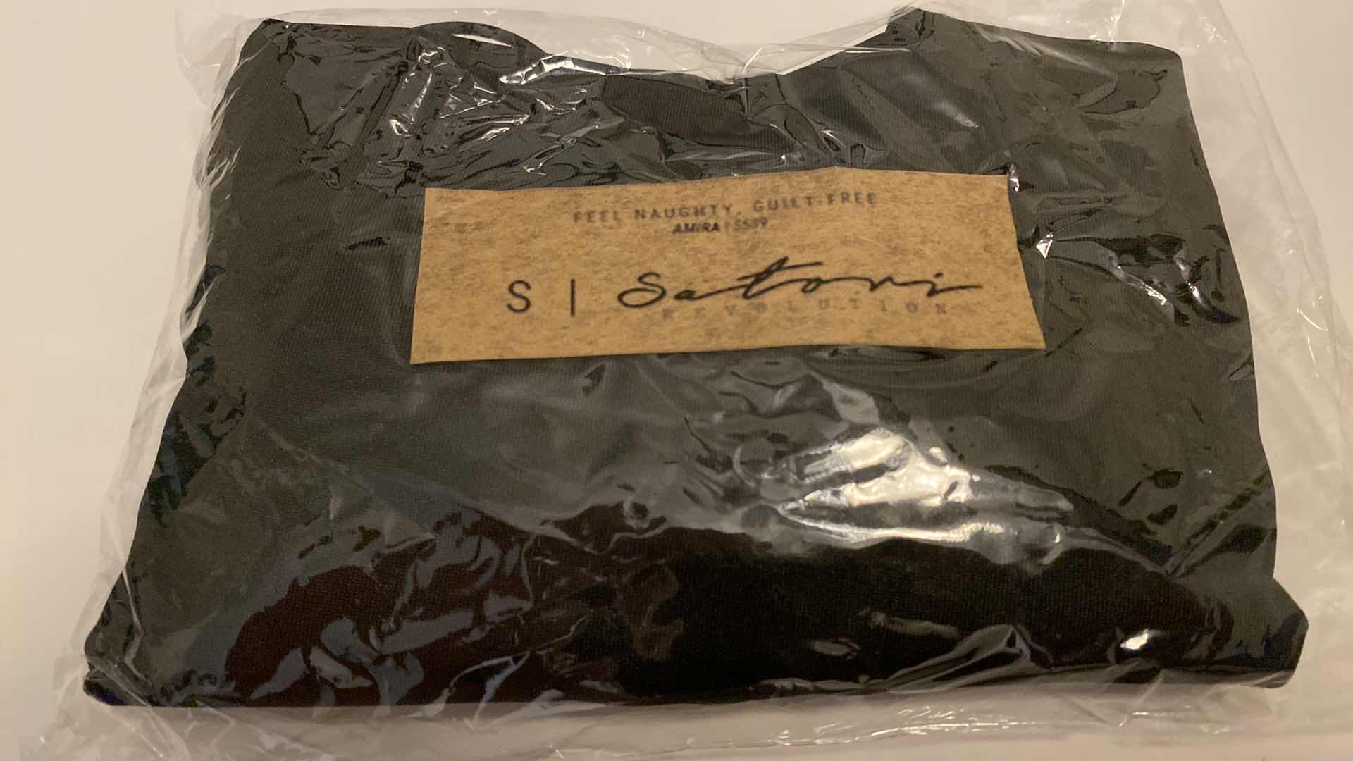 Photo 1 of SIZE SMALL BLACK AMIRA BODYSUIT FEATURES ROUND NECKLINE STRAPS AND HI-CUT LEGS. ULTRA SOFT COTTON LINING FOR PEAK COMFORT.