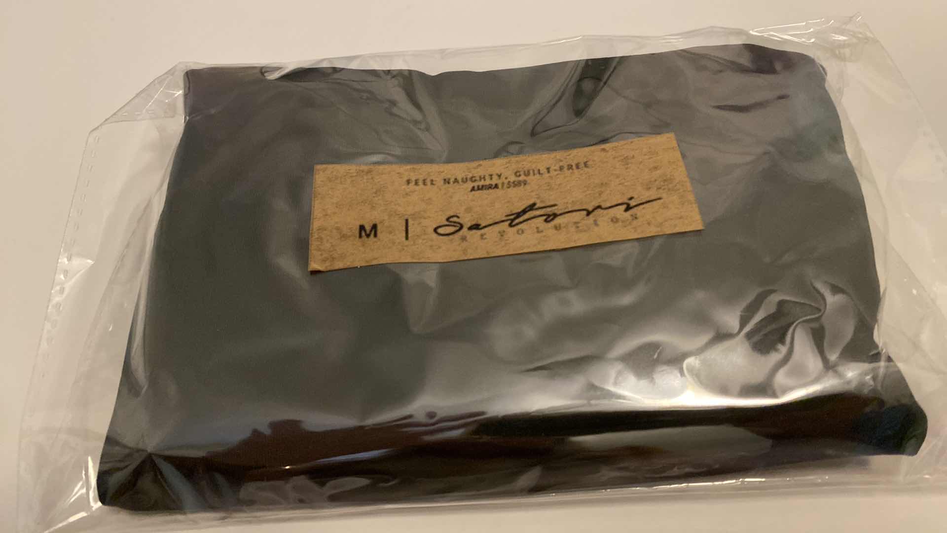 Photo 1 of SIZE MEDIUM BLACK AMIRA BODYSUIT FEATURES ROUND NECKLINE STRAPS AND HI-CUT LEGS. ULTRA SOFT COTTON LINING FOR PEAK COMFORT.