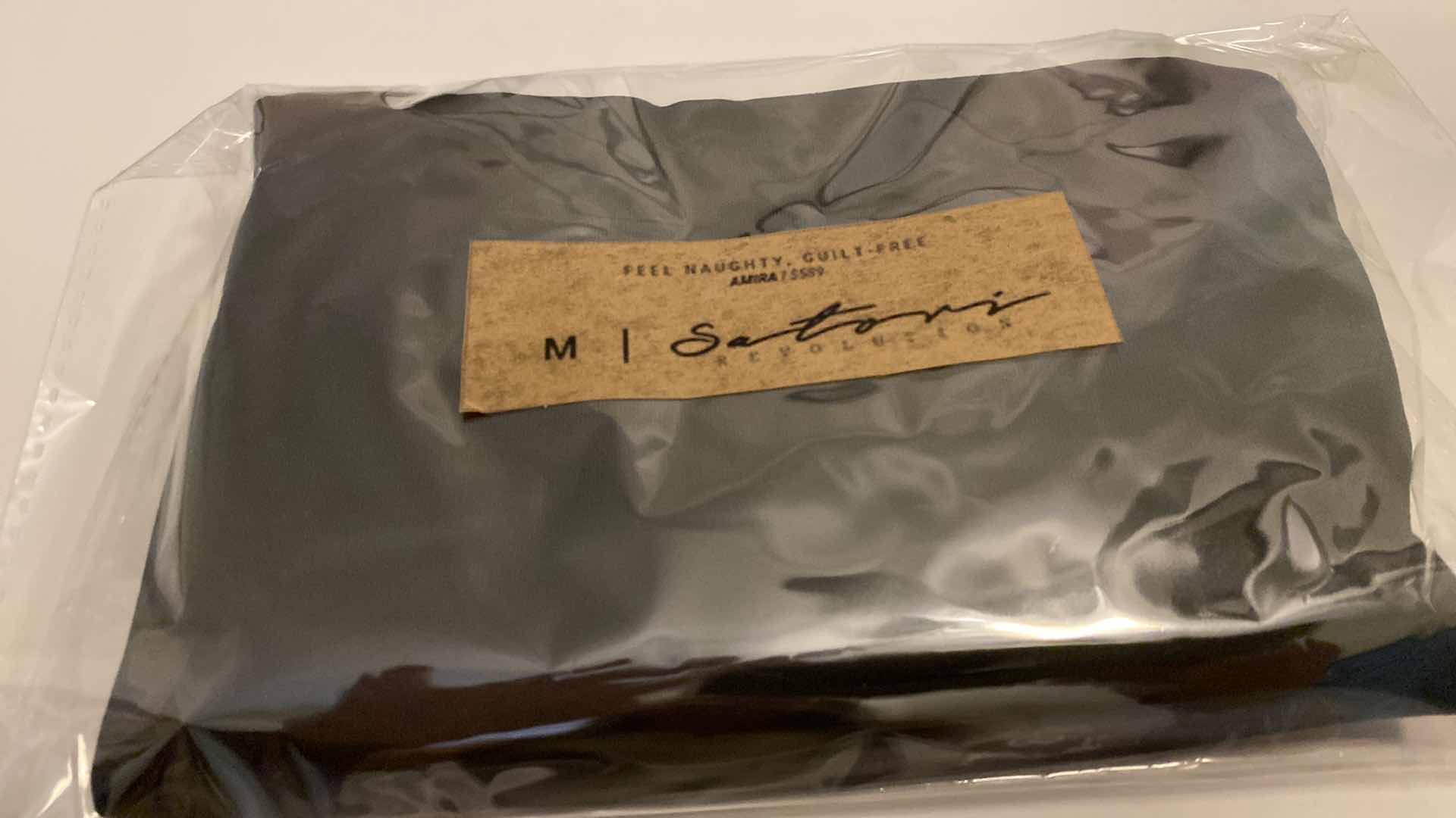 Photo 5 of SIZE MEDIUM BLACK AMIRA BODYSUIT FEATURES ROUND NECKLINE STRAPS AND HI-CUT LEGS. ULTRA SOFT  COTTON LINING FOR PEAK COMFORT.