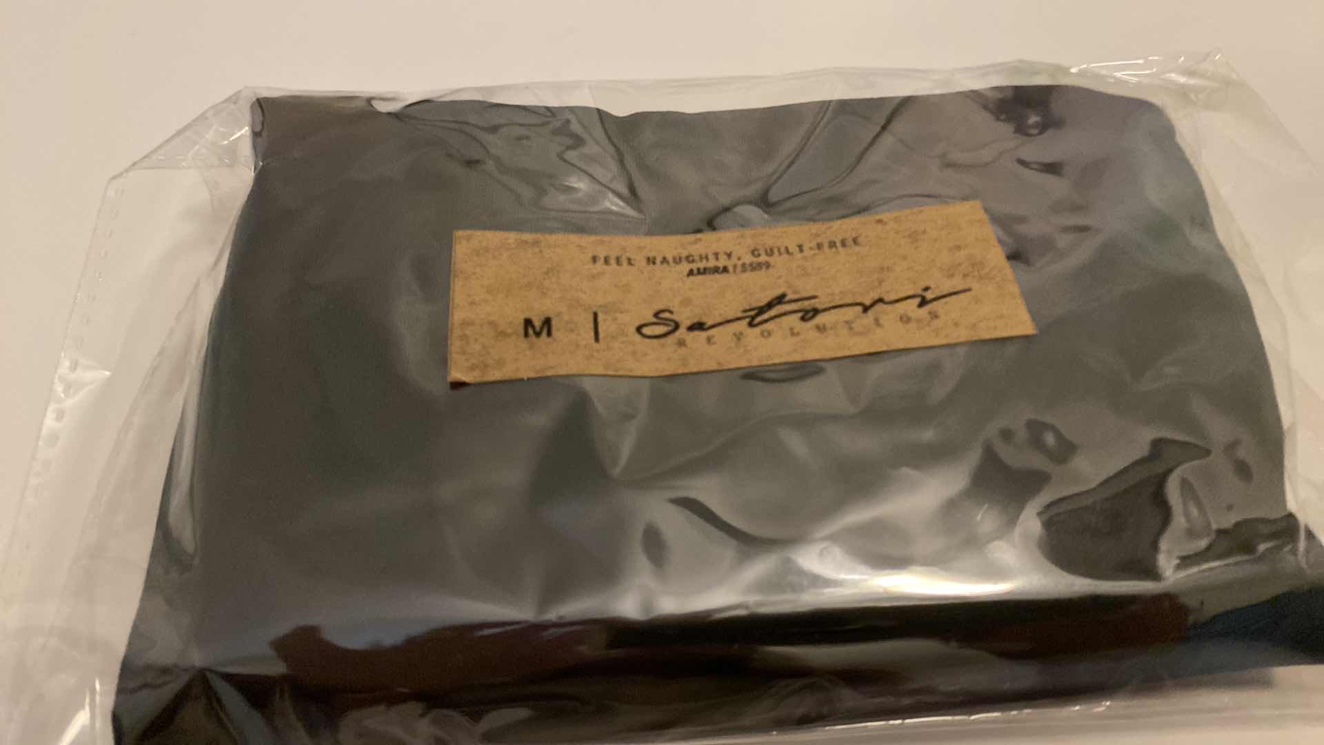 Photo 4 of SIZE MEDIUM BLACK AMIRA BODYSUIT FEATURES ROUND NECKLINE STRAPS AND HI-CUT LEGS. ULTRA SOFT COTTON LINING FOR PEAK COMFORT.