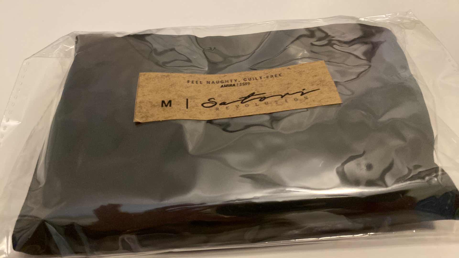 Photo 1 of SIZE MEDIUM BLACK AMIRA BODYSUIT FEATURES ROUND NECKLINE STRAPS AND HI-CUT LEGS. ULTRA SOFT COTTON LINING FOR PEAK COMFORT