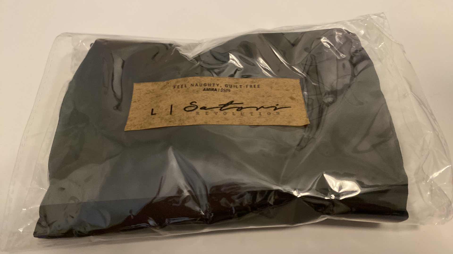 Photo 1 of SIZE LARGE BLACK AMIRA BODYSUIT FEATURES ROUND NECKLINE STRAPS AND HI-CUT LEGS. ULTRA SOFT COTTON LINING FOR PEAK COMFORT.