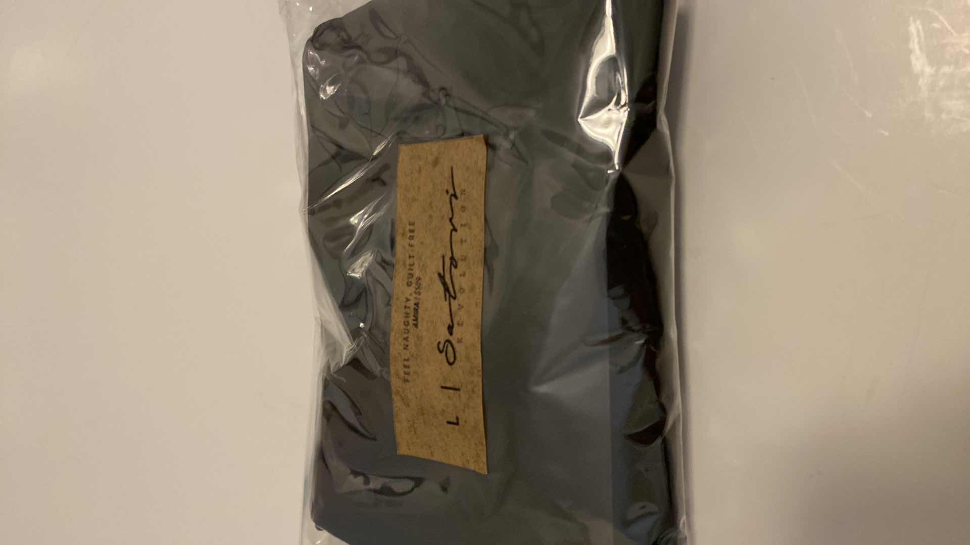 Photo 3 of SIZE LARGE BLACK AMIRA BODYSUIT FEATURES ROUND NECKLINE STRAPS AND HI-CUT LEGS. ULTRA SOFT COTTON LINING FOR PEAK COMFORT.