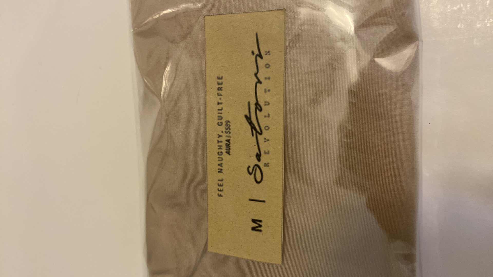 Photo 4 of SIZE MEDIUM NUDE AURA BODYSUIT FEATURES ROUND NECKLINE W EXTENDED STRAPS THAT TIE AND HIGH CUT LEGS, ULTRA SOFT COTTON LINING FOR COMFORT. CAN WEAR AS SWIMWEAR