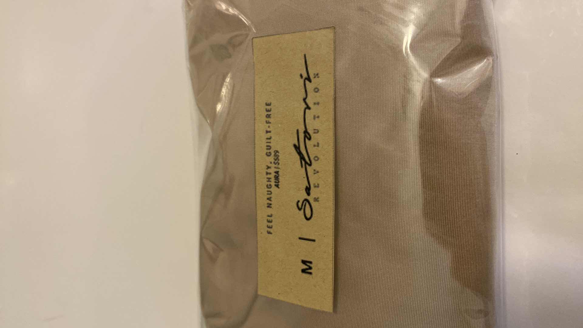 Photo 2 of SIZE MEDIUM NUDE AURA BODYSUIT FEATURES ROUND NECKLINE W EXTENDED STRAPS THAT TIE AND HIGH CUT LEGS, ULTRA SOFT COTTON LINING FOR COMFORT. CAN WEAR AS SWIMWEAR