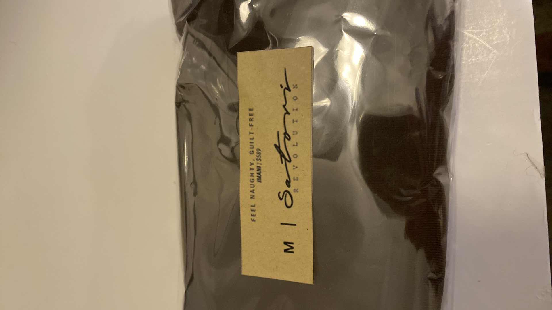 Photo 1 of SIZE MEDIUM IMANI CHOCOLATE BODYSUIT WITH A STRAIGHT LOW CUT NECKLINE THIN STRAPS AND HIGH CUT LEGS