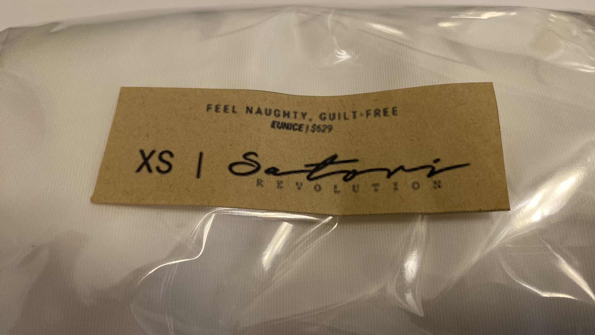 Photo 5 of SIZE X-SMALL WHITE EUNICE BODYSUIT FEATURES A BOAT NECK LINE WITH HIGH COURT LEGS AND A LOW CUT ON SIDES THAT GIVE YOU AM EDGY LOOK.