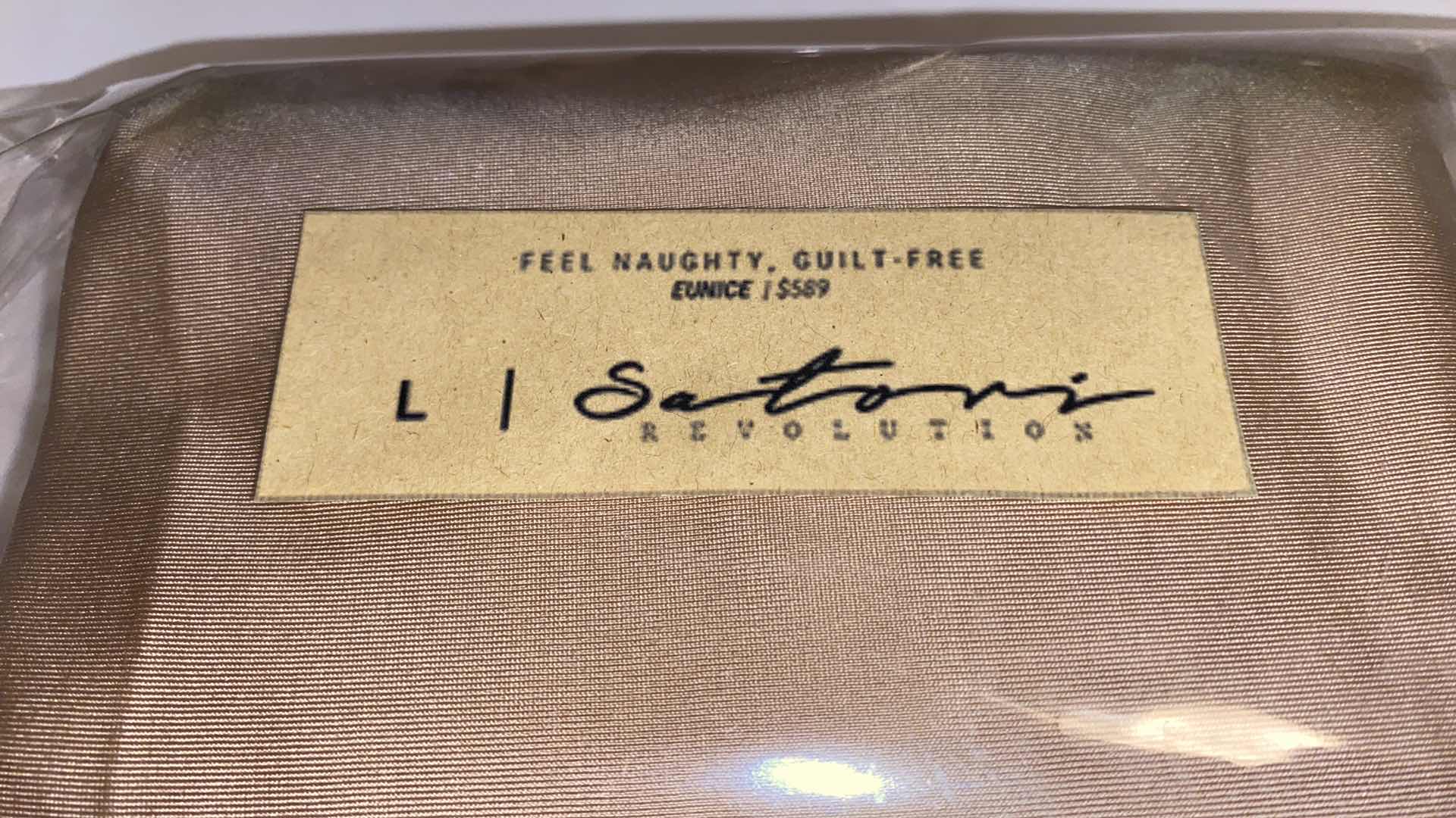 Photo 2 of SIZE LARGE  EUNICE BODYSUIT FEATURES A BOAT NECK LINE WITH HIGH COURT LEGS AND A LOW CUT ON SIDES THAT GIVE YOU AM EDGY LOOK.