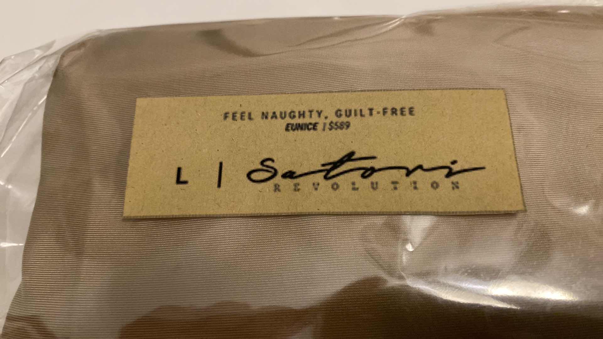 Photo 6 of SIZE LARGE  EUNICE BODYSUIT FEATURES A BOAT NECK LINE WITH HIGH COURT LEGS AND A LOW CUT ON SIDES THAT GIVE YOU AM EDGY LOOK.