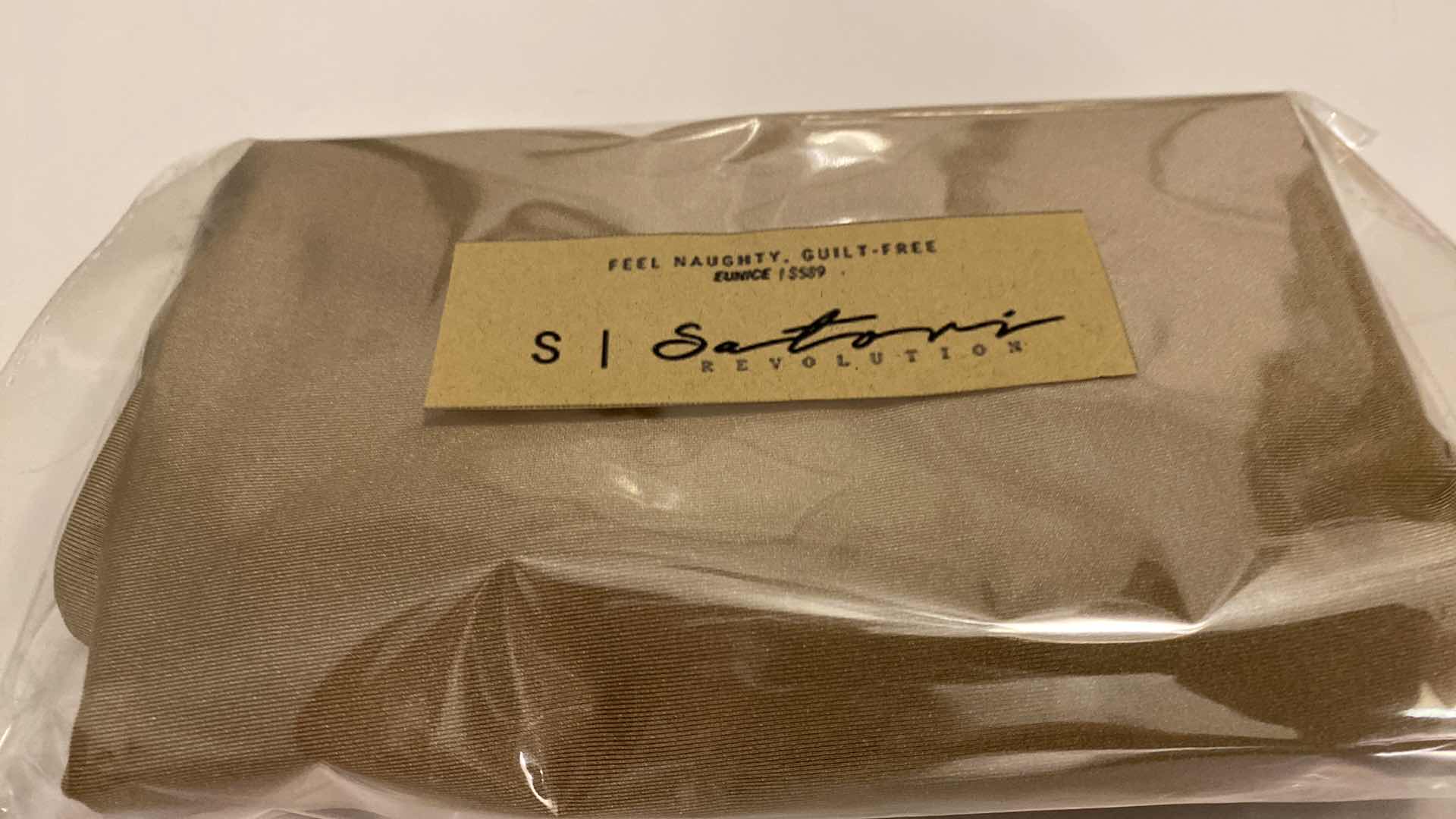 Photo 1 of SIZE SMALL EUNICE BODYSUIT FEATURES A BOAT NECK LINE WITH HIGH COURT LEGS AND A LOW CUT ON SIDES THAT GIVE YOU AM EDGY LOOK.