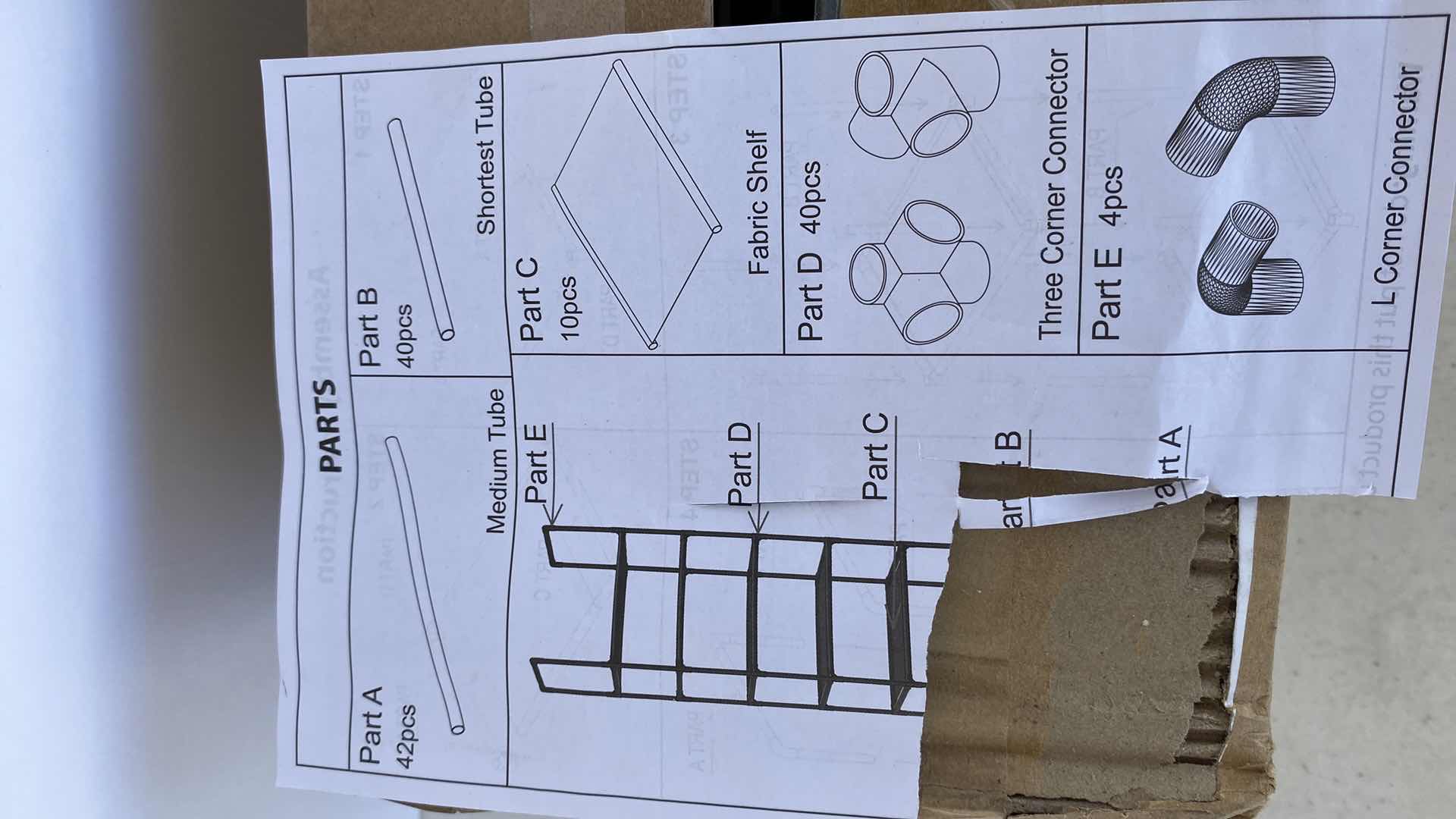 Photo 1 of FUDUCIAL HOME SHELF UNIT WITH FABRIC SHELFS SIZE UNKNOWN