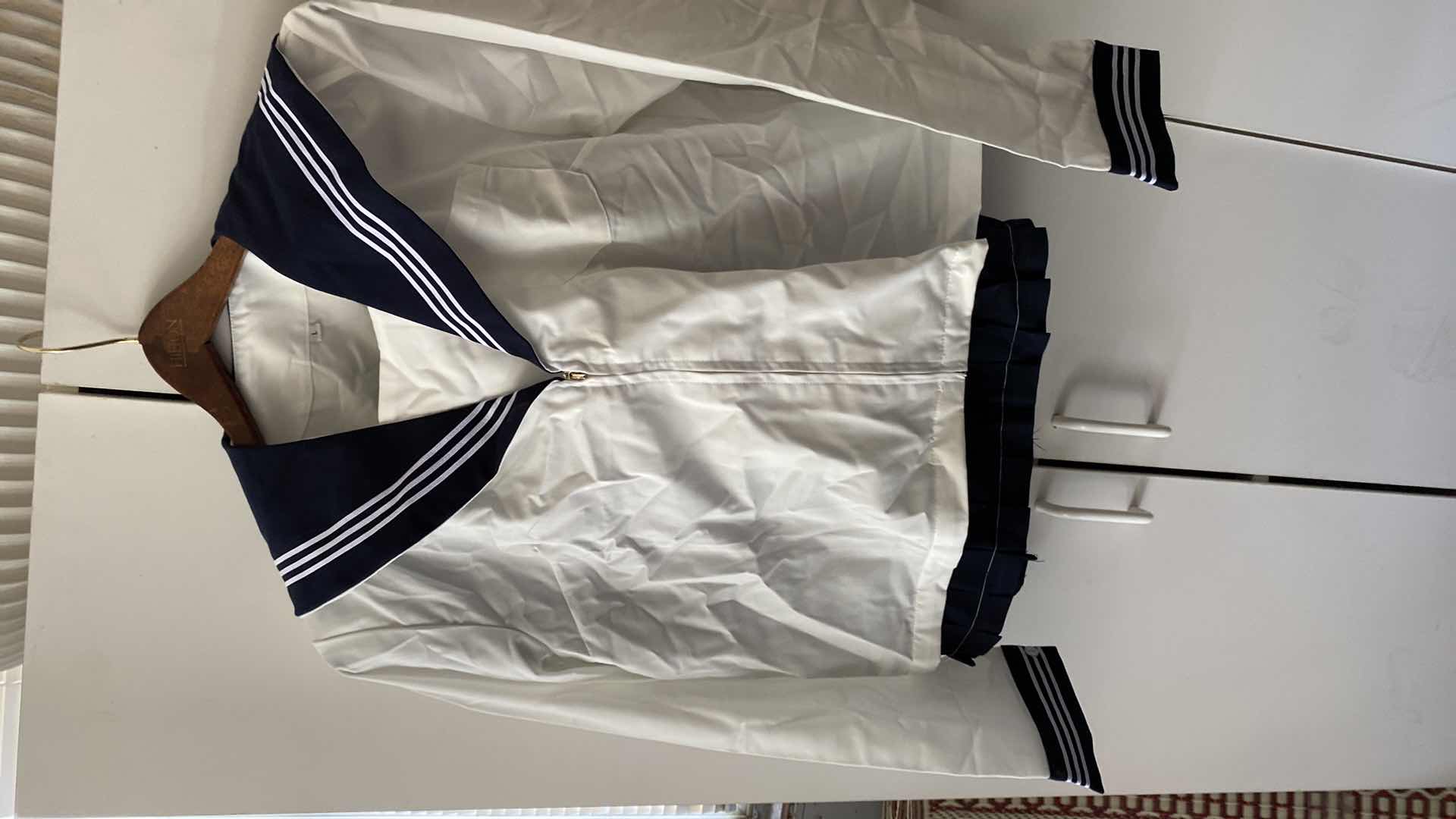 Photo 1 of WOMENS SIZE LARGE SAILOR TOP AND SKIRT