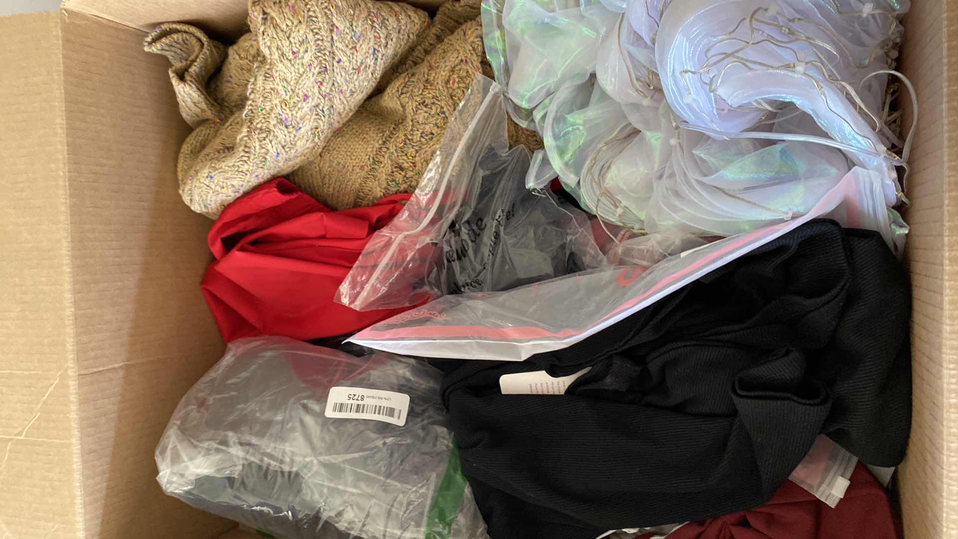 Photo 1 of BOX OF WOMEN’S CLOTHING VARIOUS SIZES NEW