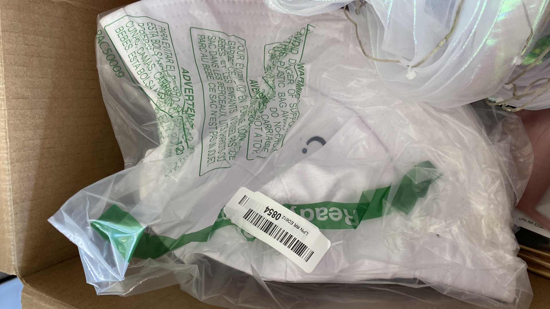 Photo 3 of BOX OF WOMEN’S CLOTHING VARIOUS SIZES NEW