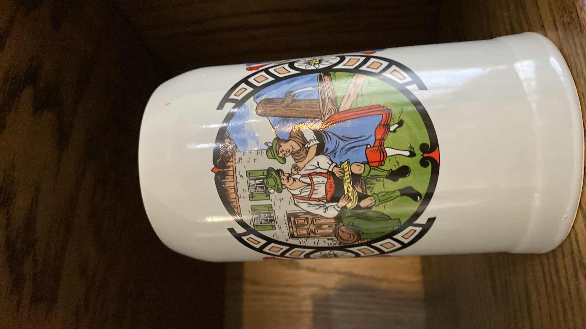 Photo 1 of PAIR OF MYNCHEN BOTTLES H10.5” FROM MUNICH AND MUG FROM EL PASO TX