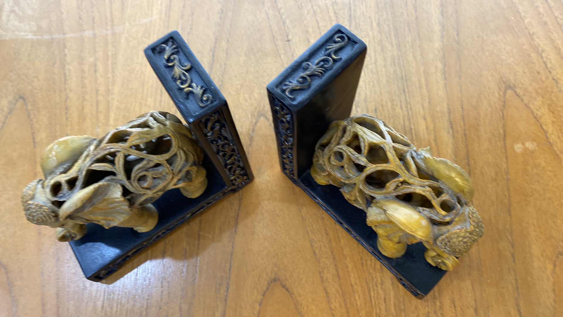 Photo 1 of RESIN AND WOOD BOOK ENDS 7” x 7”