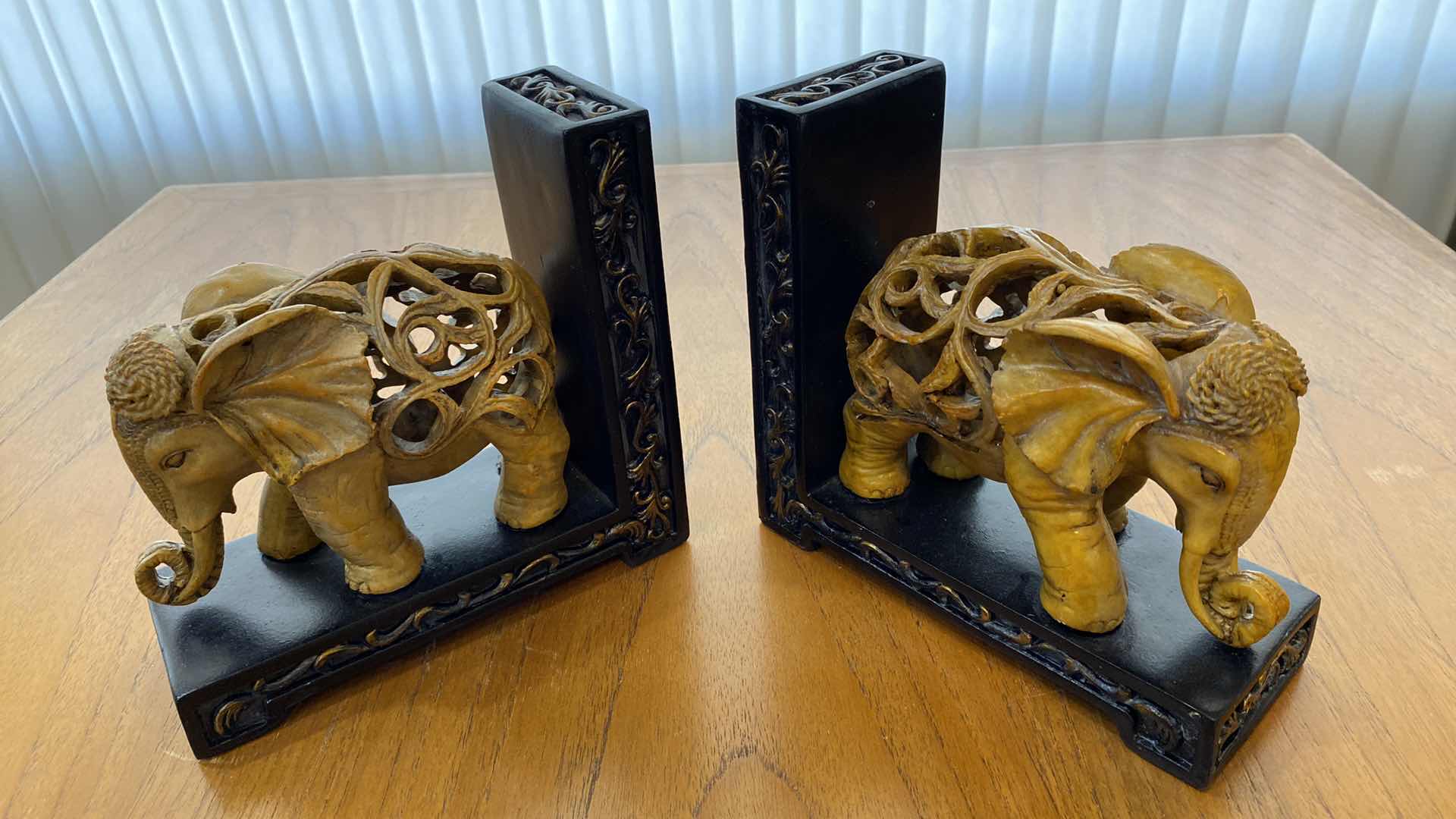 Photo 1 of RESIN AND WOOD BOOK ENDS 7” x 7”