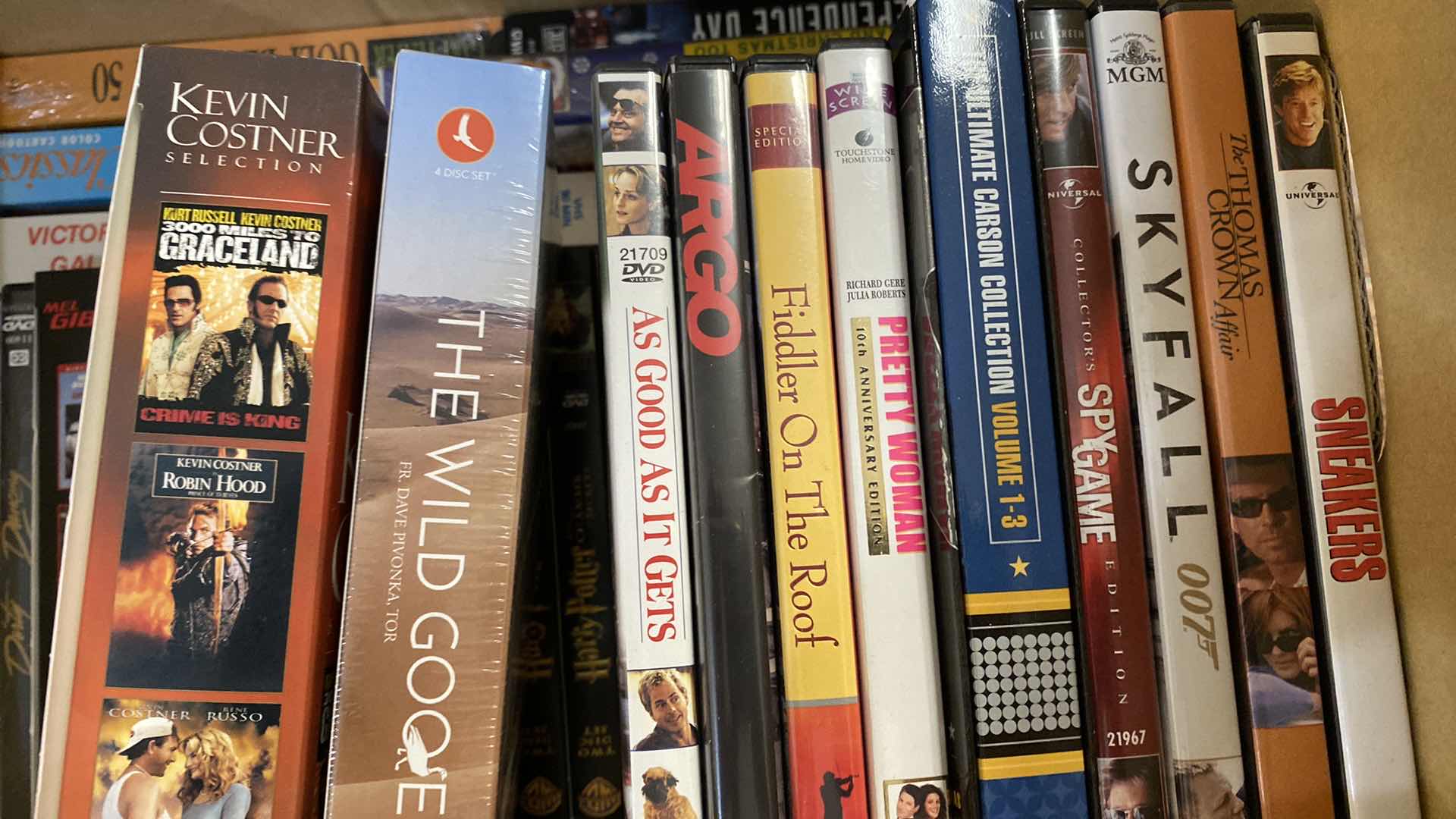 Photo 1 of LARGE BOX OF DVD AND VHS MOVIES