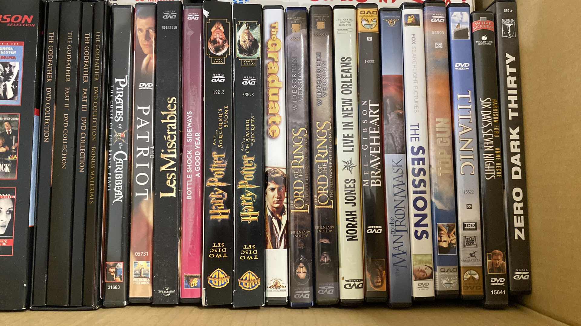 Photo 1 of LARGE BOX OF DVD AND VHS MOVIES