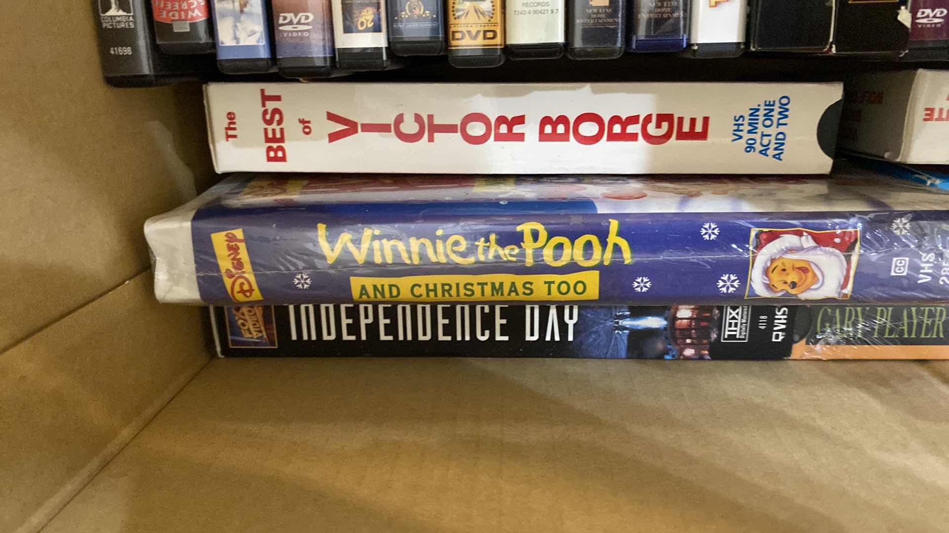 Photo 1 of LARGE BOX OF DVD AND VHS MOVIES